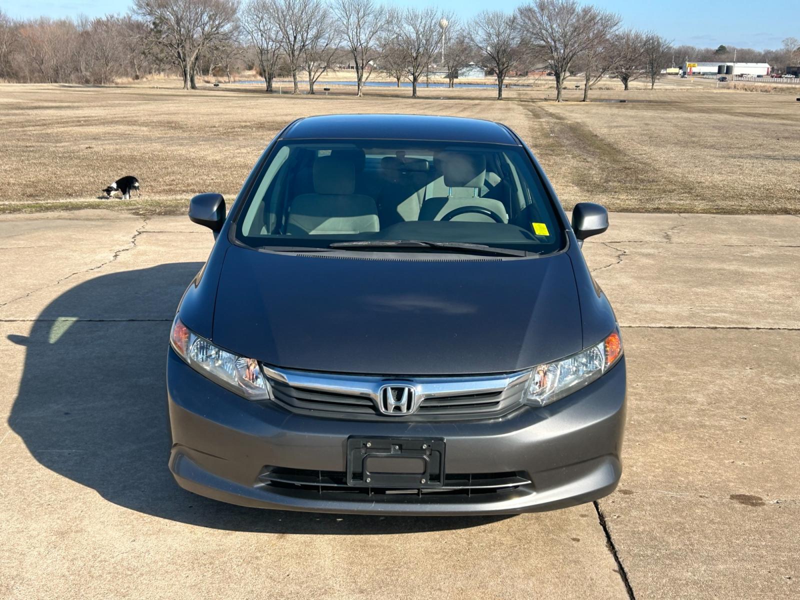 2012 Silver Honda Civic CNG Sedan 5-Speed AT (19XFB5F52CE) with an 1.8L L4 SOHC 16V CNG engine, 5-Speed Automatic transmission, located at 17760 Hwy 62, Morris, OK, 74445, (918) 733-4887, 35.609104, -95.877060 - 2012 HONDA CIVIC 1.8L FWD DEDICATED CNG (COMPRESSED NATURAL GAS) VEHICLE. 2012 HONDA CIVIC FEATURES 2 KEYS, REMOTE KEYLESS ENTRY, POWER LOCKS, POWER WINDOWS, POWER MIRRORS, MANUEL SEATS, TOUCHSCREEN RADIO, AM/FM RADIO, CD PLAYER, USB, AUX, BLUETOOTH FOR HANDS-FREE CALLING, NAVIGATION, 12V POWER OUTL - Photo #2