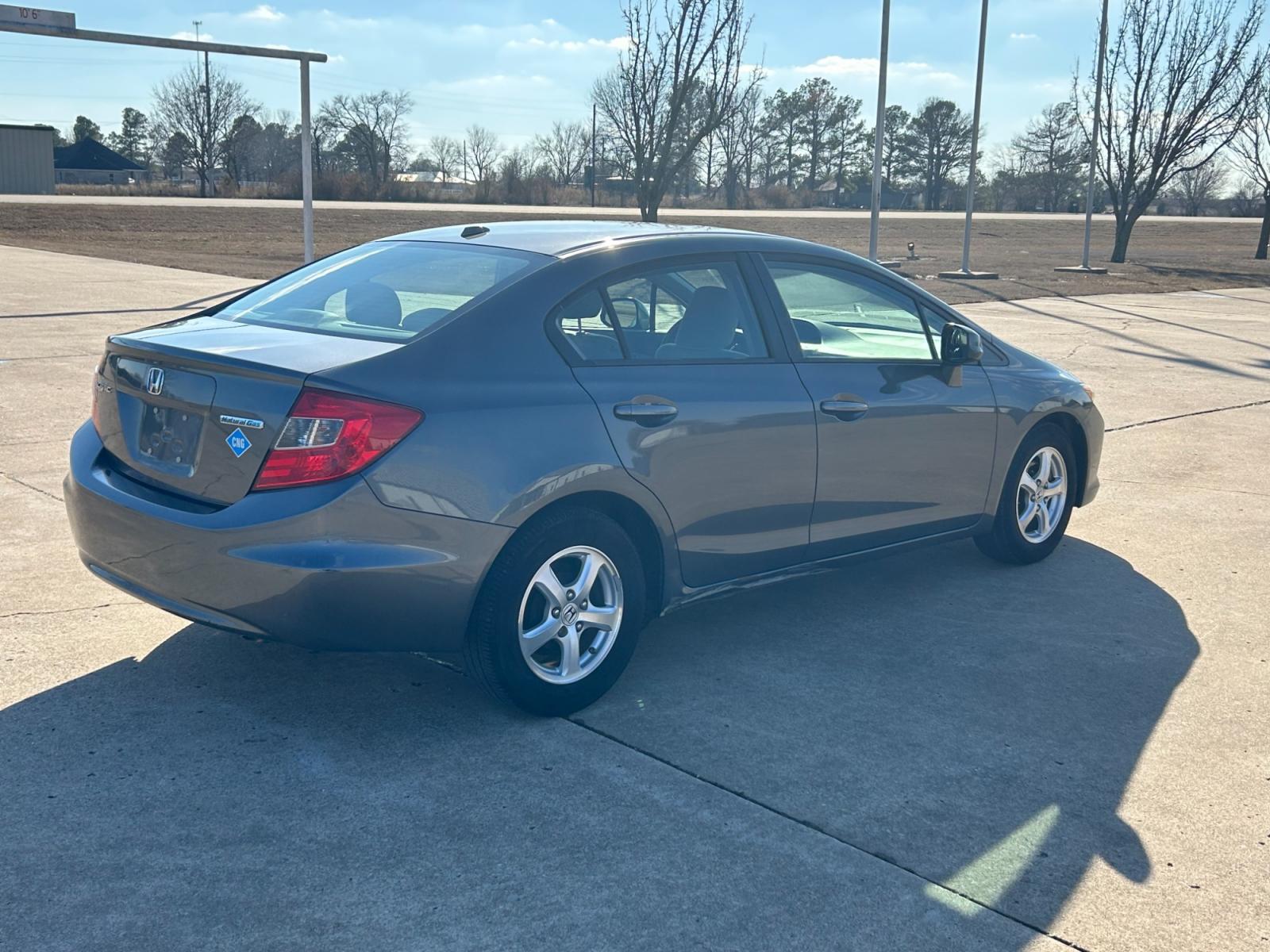 2012 Silver Honda Civic CNG Sedan 5-Speed AT (19XFB5F52CE) with an 1.8L L4 SOHC 16V CNG engine, 5-Speed Automatic transmission, located at 17760 Hwy 62, Morris, OK, 74445, (918) 733-4887, 35.609104, -95.877060 - 2012 HONDA CIVIC 1.8L FWD DEDICATED CNG (COMPRESSED NATURAL GAS) VEHICLE. 2012 HONDA CIVIC FEATURES 2 KEYS, REMOTE KEYLESS ENTRY, POWER LOCKS, POWER WINDOWS, POWER MIRRORS, MANUEL SEATS, TOUCHSCREEN RADIO, AM/FM RADIO, CD PLAYER, USB, AUX, BLUETOOTH FOR HANDS-FREE CALLING, NAVIGATION, 12V POWER OUTL - Photo #5
