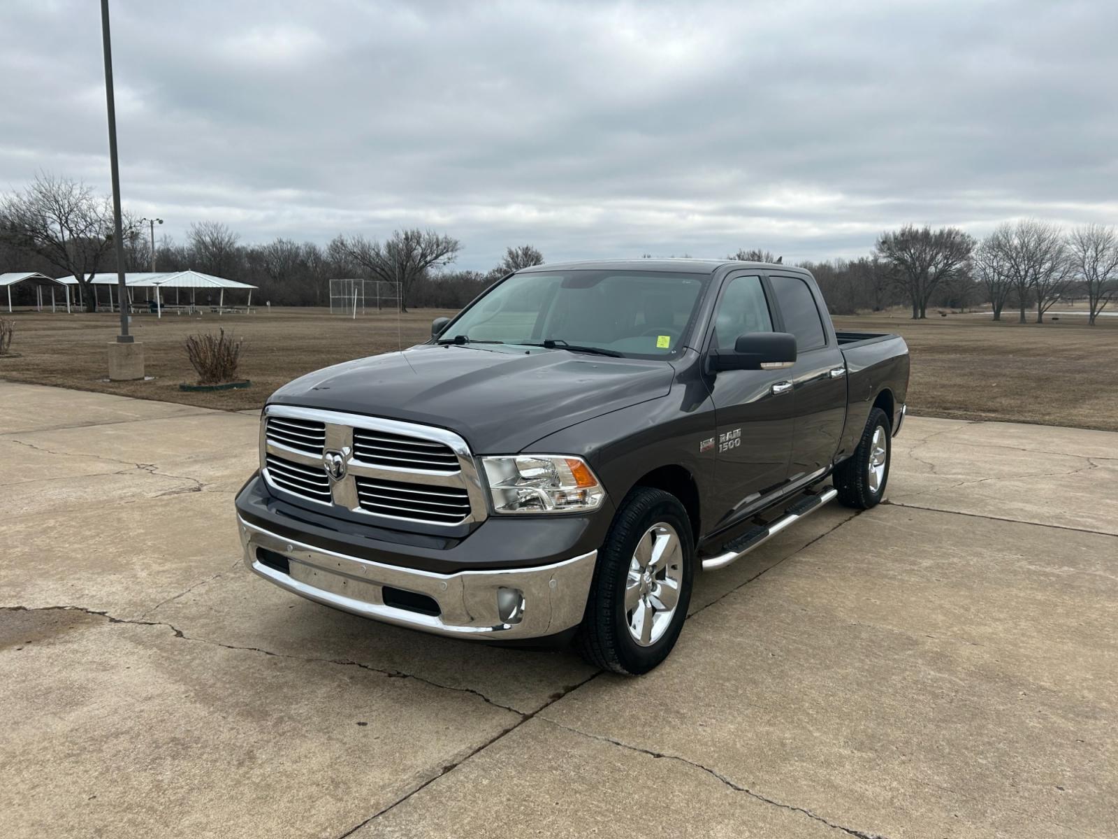 2018 GRAY RAM 1500 SLT Crew Cab LWB 2WD (1C6RR6TT1JS) with an 5.7L V8 OHV 16V engine, 8A transmission, located at 17760 Hwy 62, Morris, OK, 74445, (918) 733-4887, 35.609104, -95.877060 - 2018 DODGE RAM 1500 SLT HAS A 5.7L HEMI AND IS RWD THAT FEATURES REMOTE KEYLESS ENTRY, POWER REMOTE START, POWER LOCKS, POWER WINDOWS, POWER SEATS, POWER WINDOWS, POWER MIRRORS, POWER BACK GLASS WINDOW, AM/FM STEREO, SXM RADIO, UCONNECT, TOUCHSCREEN DISPLAY, AUX PORT, USB PORT, BLUETOOTH TECHNOLOGY, - Photo #1
