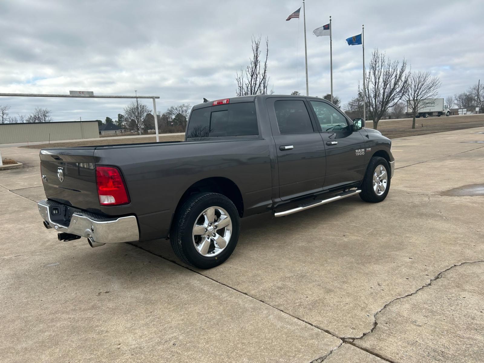2018 GRAY RAM 1500 SLT Crew Cab LWB 2WD (1C6RR6TT1JS) with an 5.7L V8 OHV 16V engine, 8A transmission, located at 17760 Hwy 62, Morris, OK, 74445, (918) 733-4887, 35.609104, -95.877060 - 2018 DODGE RAM 1500 SLT HAS A 5.7L HEMI AND IS RWD THAT FEATURES REMOTE KEYLESS ENTRY, POWER REMOTE START, POWER LOCKS, POWER WINDOWS, POWER SEATS, POWER WINDOWS, POWER MIRRORS, POWER BACK GLASS WINDOW, AM/FM STEREO, SXM RADIO, UCONNECT, TOUCHSCREEN DISPLAY, AUX PORT, USB PORT, BLUETOOTH TECHNOLOGY, - Photo #5