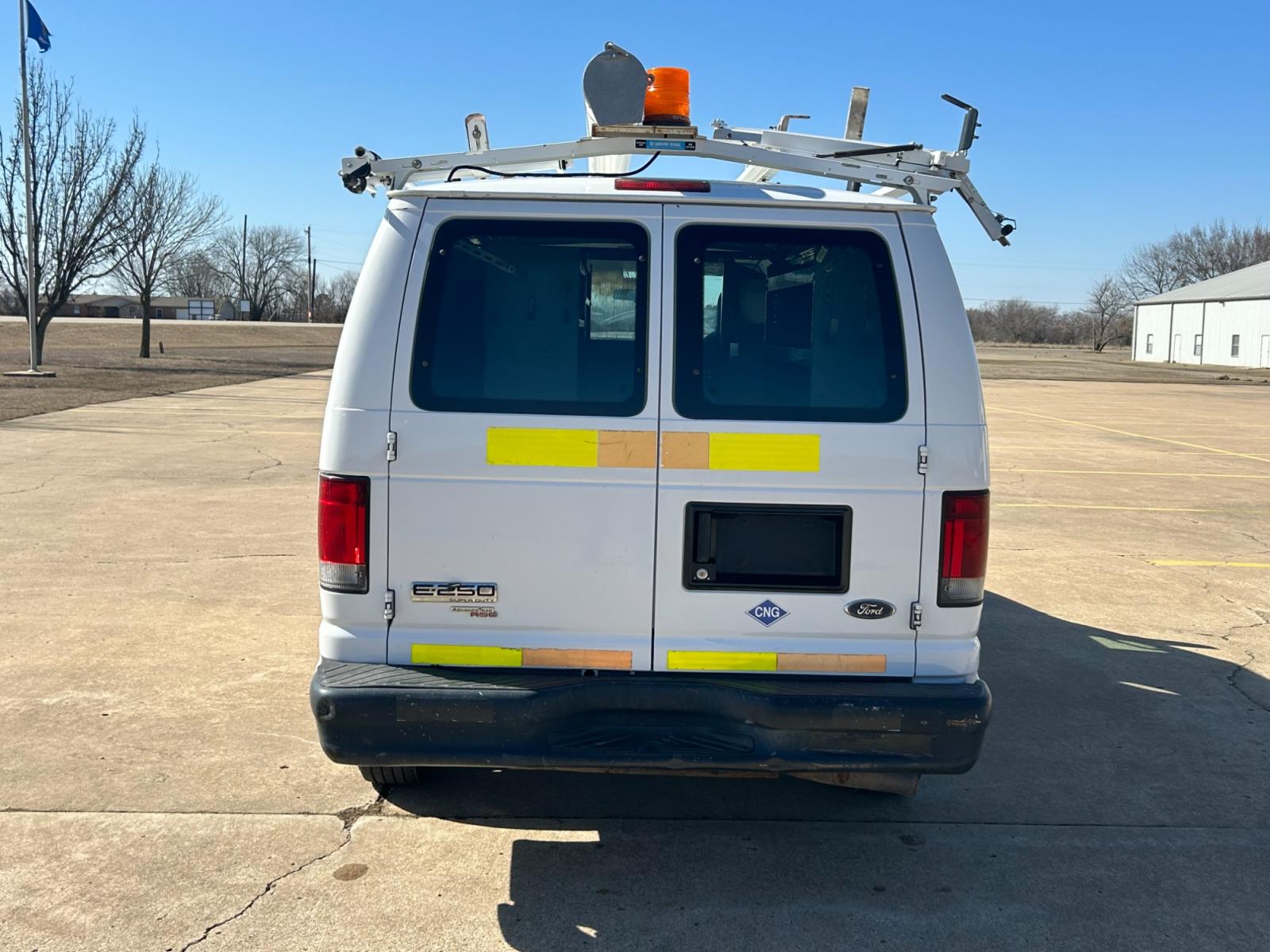 2011 White Ford E-Series Van E-250 (1FTNE2EL6BD) with an 5.4L V8 SOHC 16V engine, 4-Speed Automatic transmission, located at 17760 Hwy 62, Morris, OK, 74445, (918) 733-4887, 35.609104, -95.877060 - 2011 FORD E-SERIES VAN E-250 5.4 V8 DEDICATED CNG (COMPRESSED NATURAL GAS) DOES NOT RUN ON GASOLINE. THE FORD E-SERIES VAN FEATURES MANUAL SEATS, MANUAL LOCKS, MANUAL WINDOWS, MANUAL MIRRORS, FRONT HEAT AND AIR, AM/FM RADIO, LEATHER SEATS, STEEL SHELVES, SPLIT SWING-OUT RIGHT DOORS, AND PLENTY OF SP - Photo #6