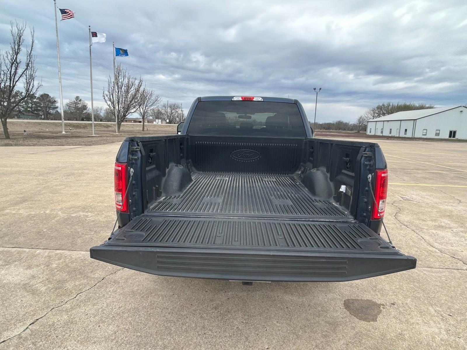 2015 BLUE Ford F-150 XL SuperCab 6.5-ft. Bed 2WD (1FTEX1CP5FF) with an 2.7L V6 DOHC 24V engine, 6-Speed Automatic transmission, located at 17760 Hwy 62, Morris, OK, 74445, (918) 733-4887, 35.609104, -95.877060 - 2015 FORD F150 XL HAS A 2.7L V6 ENGINE AND RWD, FEATURES A KEYLESS LOCKING REMOTE, POWER SEATS, POWER FOOT PEDAL ADJUSTER, POWER LOCKS, POWER WINDOWS, POWER MIRRORS, AM/FM STEREO, SIRIUS RADIO, CD PLAYER, AUX PORT, USB PORT, AUTO START/STOP TECHNOLOGY, CLOTH INTERIOR, CRUISE CONTROL, TRACTION CONTRO - Photo #21