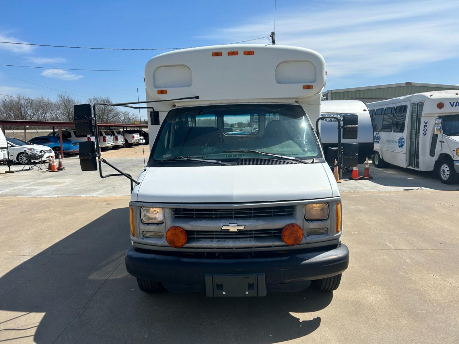 1999 White Chevrolet Express 3500 Cargo (1GBHG31F7X1) with an 6.5L V8 OHV 16V TURBO DIESEL engine, 4-Speed Automatic Overdrive transmission, located at 17760 Hwy 62, Morris, OK, 74445, (918) 733-4887, 35.609104, -95.877060 - 1999 CHEVROLET EXPRESS 3500 SHORT BUS HAS A 6.5L TURBO DIESEL AND RWD. FEATURES LEATHER SEATS, AM/FM STEREO, MANUAL LOCKS, MANUAL SEATS, MANUAL, WINDOWS, STORAGE BINS IN BACK, 168,956 MILES, CLEAN TITLE, 225/75R16 TIRES. NO HIDDEN FEES OF ANY KIND. WE DO NOT FINANCE $5,800 CALL RUSS OR JONA AT 9 - Photo #2