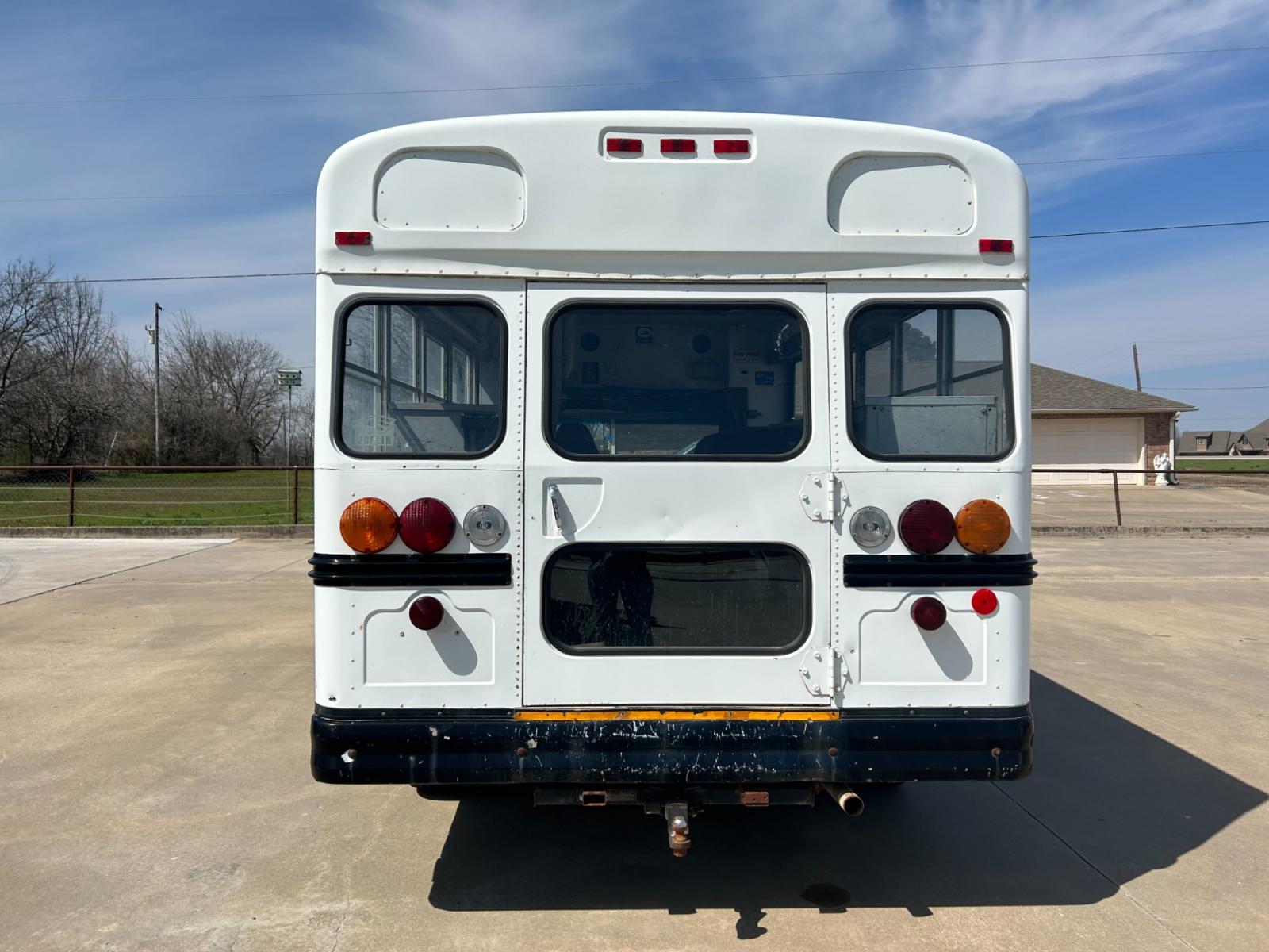 1999 White Chevrolet Express 3500 Cargo (1GBHG31F7X1) with an 6.5L V8 OHV 16V TURBO DIESEL engine, 4-Speed Automatic Overdrive transmission, located at 17760 Hwy 62, Morris, OK, 74445, (918) 733-4887, 35.609104, -95.877060 - 1999 CHEVROLET EXPRESS 3500 SHORT BUS HAS A 6.5L TURBO DIESEL AND RWD. FEATURES LEATHER SEATS, AM/FM STEREO, MANUAL LOCKS, MANUAL SEATS, MANUAL, WINDOWS, STORAGE BINS IN BACK, 168,956 MILES, CLEAN TITLE, 225/75R16 TIRES. NO HIDDEN FEES OF ANY KIND. WE DO NOT FINANCE $5,800 CALL RUSS OR JONA AT 9 - Photo #6