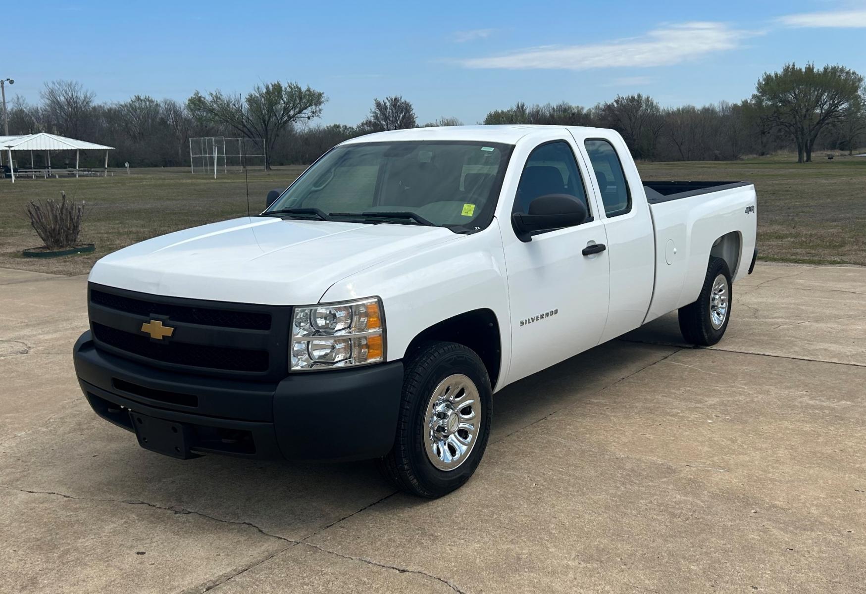 2012 White Chevrolet Silverado 1500 Work Truck Ext. Cab 4WD (1GCRKPE0XCZ) with an 5.3L V8 OHV 16V FFV engine, 4-Speed Automatic transmission, located at 17760 Hwy 62, Morris, OK, 74445, (918) 733-4887, 35.609104, -95.877060 - 2012 CHEVY SILVERADO 1500 LT HAS THE 5.3L V8 AND IS 4X4. THIS IS A BI-FUEL TRUCK THAT RUNS ON BOTH CNG OR GASOLINE, FEATURES REMOTE KEYLESS ENTRY, POWER LOCKS, POWER WINDOWS, POWER MIRRORS, MANUAL SEATS, AM/FM STEREO, CD PLAYER, AUX PORT, CLOTH INTERIOR, TRACTION CONTROL, BEDLINER, AND TOW PACKAGE. - Photo #1