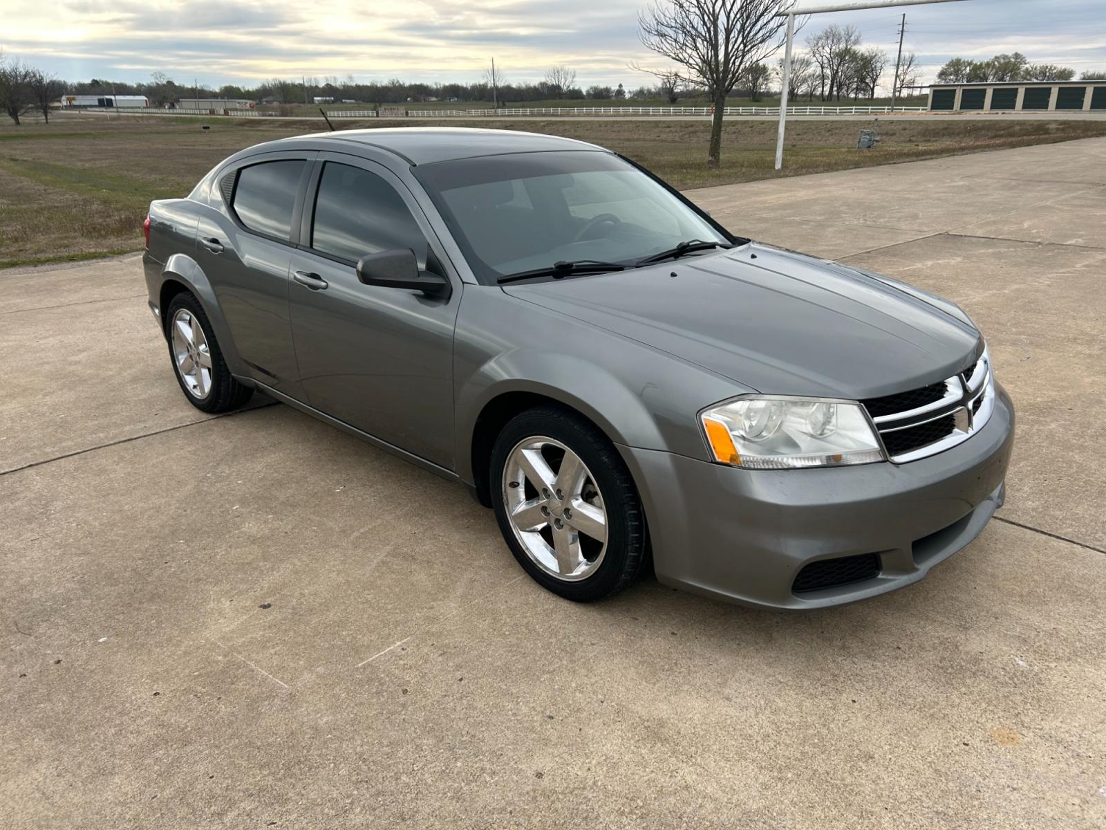 2012 GRAY Dodge Avenger Base (1C3CDZABXCN) with an 2.4L L4 DOHC 16V engine, 4-Speed Automatic transmission, located at 17760 Hwy 62, Morris, OK, 74445, (918) 733-4887, 35.609104, -95.877060 - 2012 DODGE AVENGER HAS 2.4L AND IS FWD, FEATURES A KEYLESS ENTRY REMOTE, POWER WINDOWS, POWER LOCKS, POWER MIRRORS, MANUAL SEATS, AM/FM STEREO, CD PLAYER, AUX PORT, CLOTH INTERIOR, TRACTION CONTROL, CRUISE CONTROL, 154,805 MILES, AND 225/50R18 TIRES. ***DOES HAVE REBUILT TITLE DUE TO HAIL DAMAGE AS - Photo #3