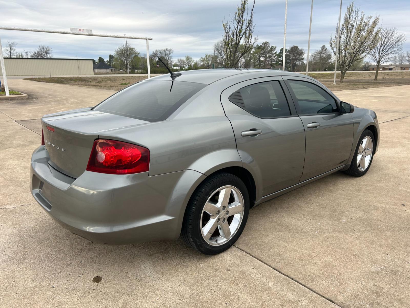 2012 GRAY Dodge Avenger Base (1C3CDZABXCN) with an 2.4L L4 DOHC 16V engine, 4-Speed Automatic transmission, located at 17760 Hwy 62, Morris, OK, 74445, (918) 733-4887, 35.609104, -95.877060 - 2012 DODGE AVENGER HAS 2.4L AND IS FWD, FEATURES A KEYLESS ENTRY REMOTE, POWER WINDOWS, POWER LOCKS, POWER MIRRORS, MANUAL SEATS, AM/FM STEREO, CD PLAYER, AUX PORT, CLOTH INTERIOR, TRACTION CONTROL, CRUISE CONTROL, 154,805 MILES, AND 225/50R18 TIRES. ***DOES HAVE REBUILT TITLE DUE TO HAIL DAMAGE AS - Photo #5