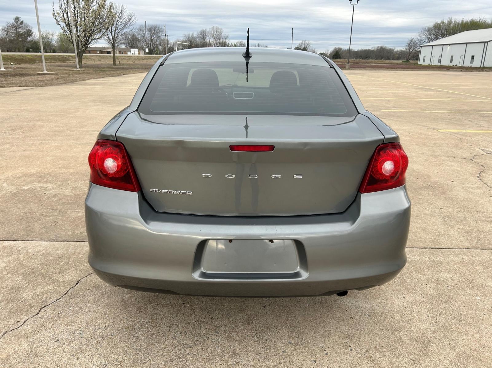2012 GRAY Dodge Avenger Base (1C3CDZABXCN) with an 2.4L L4 DOHC 16V engine, 4-Speed Automatic transmission, located at 17760 Hwy 62, Morris, OK, 74445, (918) 733-4887, 35.609104, -95.877060 - 2012 DODGE AVENGER HAS 2.4L AND IS FWD, FEATURES A KEYLESS ENTRY REMOTE, POWER WINDOWS, POWER LOCKS, POWER MIRRORS, MANUAL SEATS, AM/FM STEREO, CD PLAYER, AUX PORT, CLOTH INTERIOR, TRACTION CONTROL, CRUISE CONTROL, 154,805 MILES, AND 225/50R18 TIRES. ***DOES HAVE REBUILT TITLE DUE TO HAIL DAMAGE AS - Photo #6
