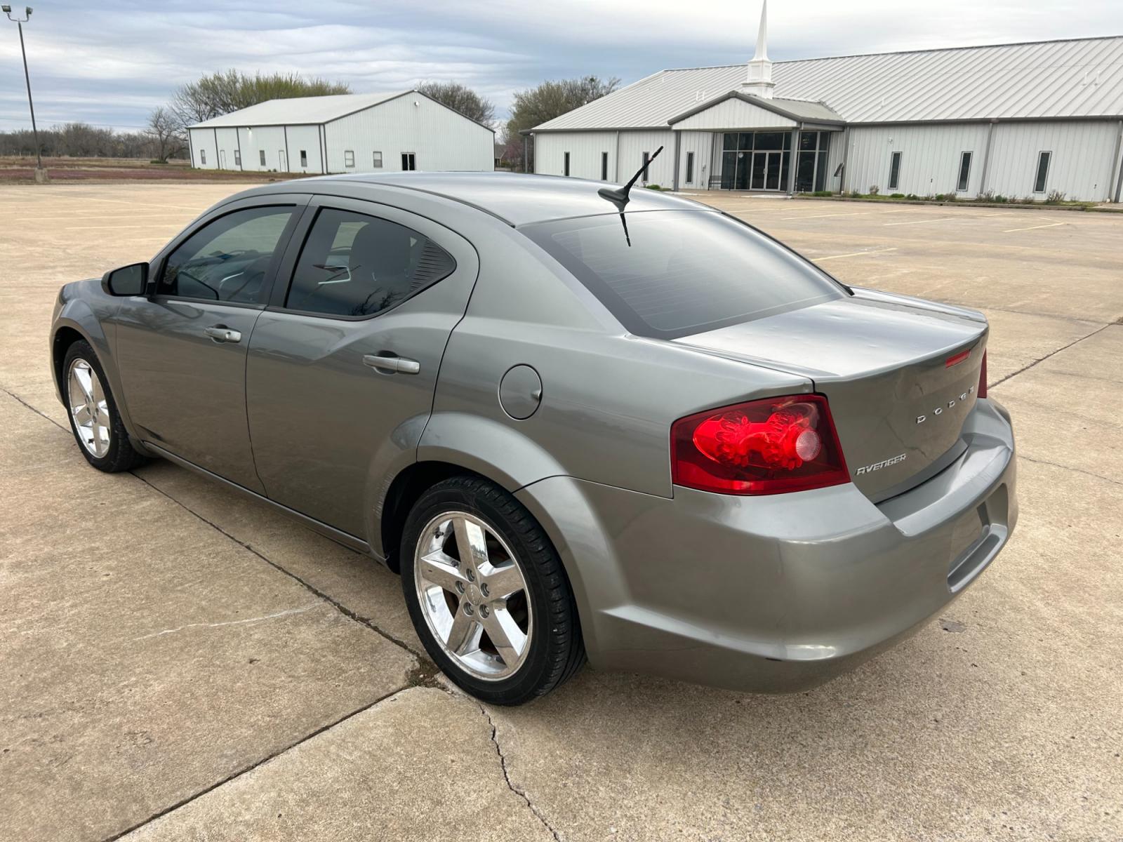 2012 GRAY Dodge Avenger Base (1C3CDZABXCN) with an 2.4L L4 DOHC 16V engine, 4-Speed Automatic transmission, located at 17760 Hwy 62, Morris, OK, 74445, (918) 733-4887, 35.609104, -95.877060 - 2012 DODGE AVENGER HAS 2.4L AND IS FWD, FEATURES A KEYLESS ENTRY REMOTE, POWER WINDOWS, POWER LOCKS, POWER MIRRORS, MANUAL SEATS, AM/FM STEREO, CD PLAYER, AUX PORT, CLOTH INTERIOR, TRACTION CONTROL, CRUISE CONTROL, 154,805 MILES, AND 225/50R18 TIRES. ***DOES HAVE REBUILT TITLE DUE TO HAIL DAMAGE AS - Photo #7