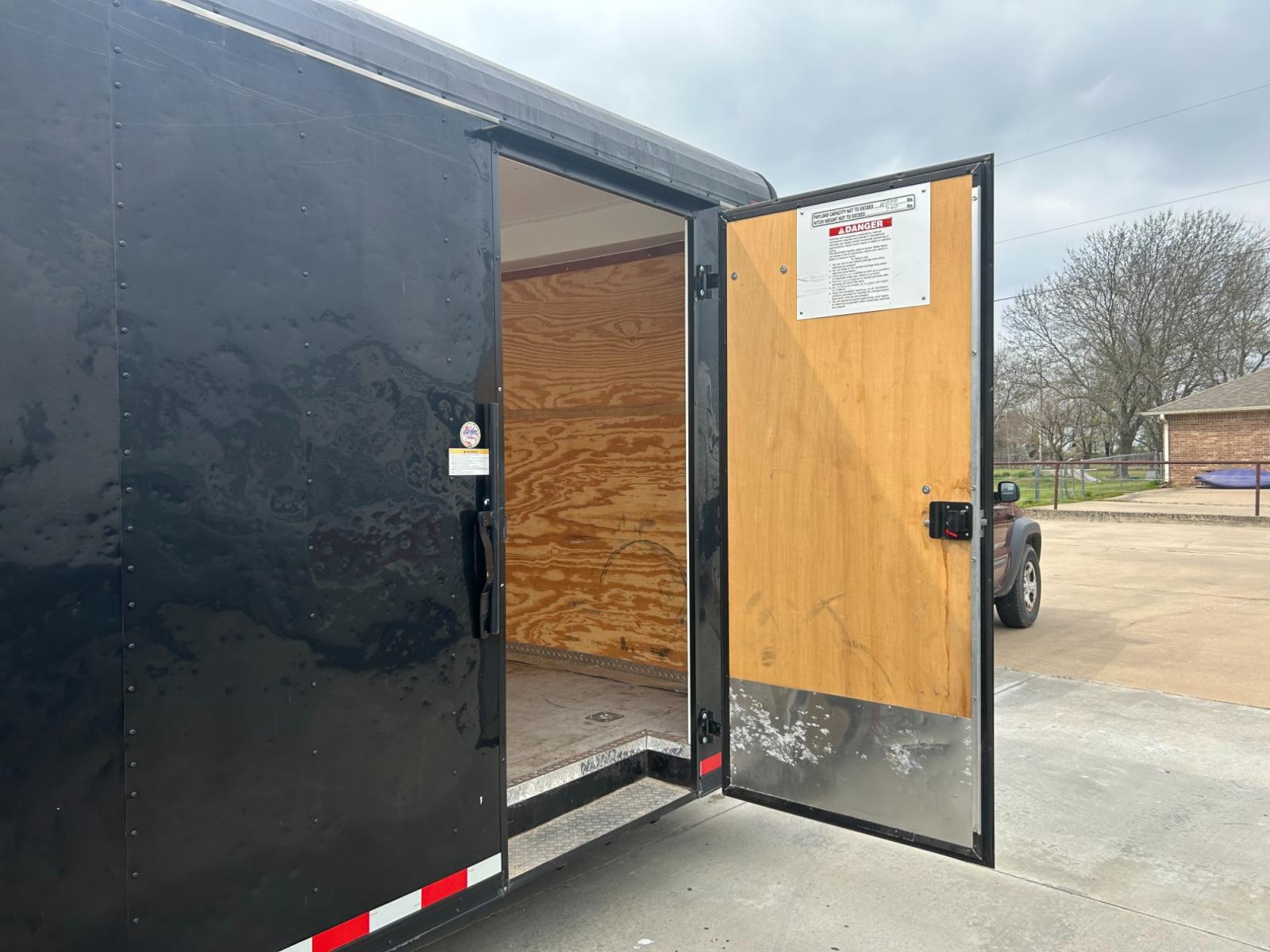 2017 BLACK Cargo Craft, Inc Unknown - (4D6EB2021HC) , located at 17760 Hwy 62, Morris, OK, 74445, 35.609104, -95.877060 - THE 2017 CARGO CRAFT ENCLOSED TRAILER IS 20 FEET LONG AND 8'4 WIDE. IT DOES HAVE HAIL DAMAGE AS SHOWN IN THE PICTURES, BUT EVERYTHING IS FUNCTIONING AS IT SHOULD. EXTRA LONG HITCH FOR EASY BACKING. ***THERE WILL BE A 6.25% SALES TAX ADDED TO THE PRICE, IF YOU HAVE A TAX EXEMPTION CARD YOU WILL NEED - Photo #8