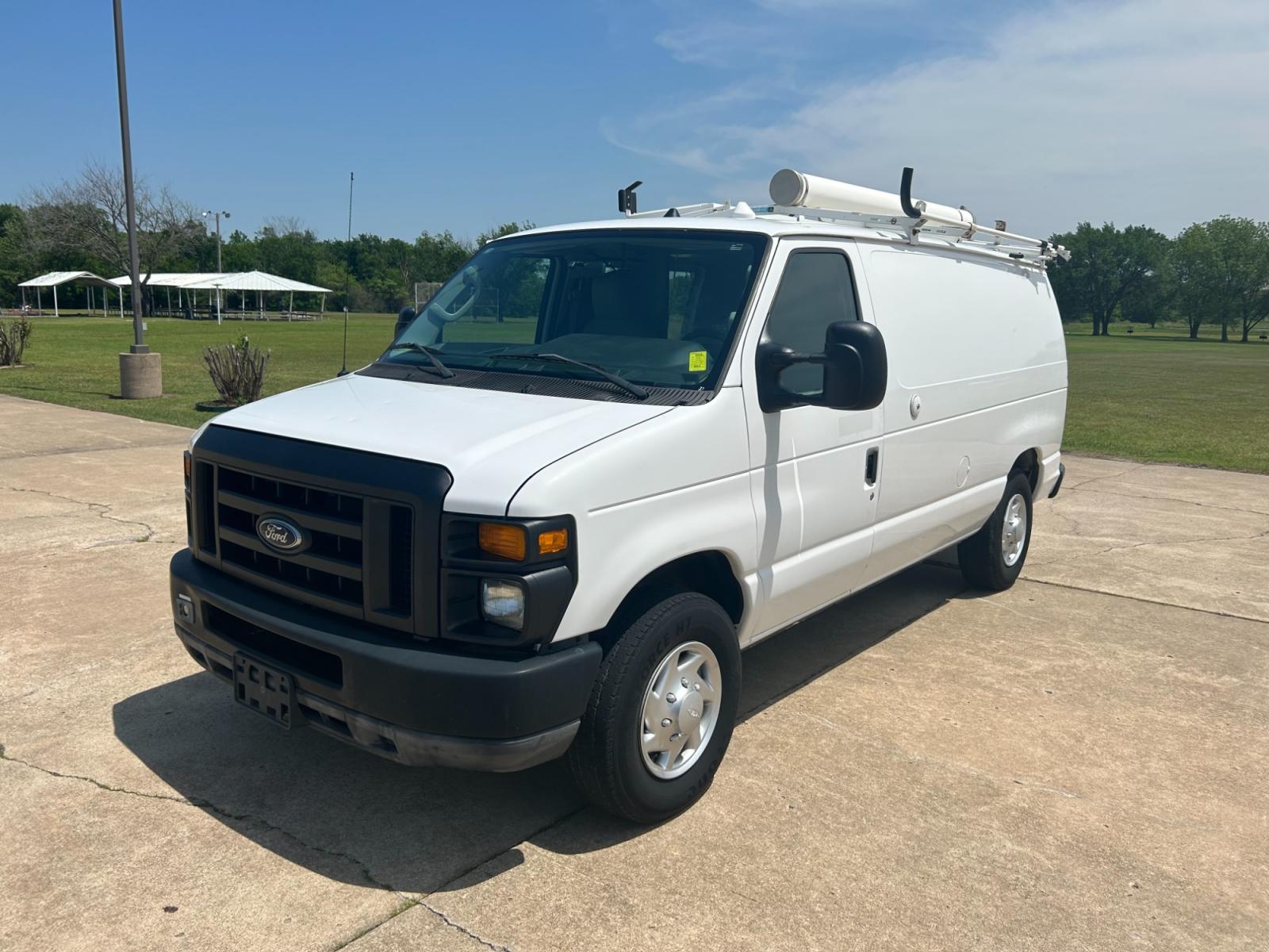 2011 White Ford E-Series Van E-250 (1FTNE2EL5BD) with an 5.4L V8 SOHC 16V engine, 4-Speed Automatic transmission, located at 17760 Hwy 62, Morris, OK, 74445, (918) 733-4887, 35.609104, -95.877060 - 2011 FORD E-SERIES VAN E-250 5.4 V8 DEDICATED CNG (COMPRESSED NATURAL GAS) DOES NOT RUN ON GASOLINE. THE FORD E-SERIES VAN FEATURES MANUAL SEATS, MANUAL LOCKS, MANUAL WINDOWS, MANUAL MIRRORS, FRONT HEAT AND AIR, AM/FM RADIO, LEATHER SEATS, STEEL SHELVES, SPLIT SWING-OUT RIGHT DOORS, AND PLENTY OF SP - Photo #1