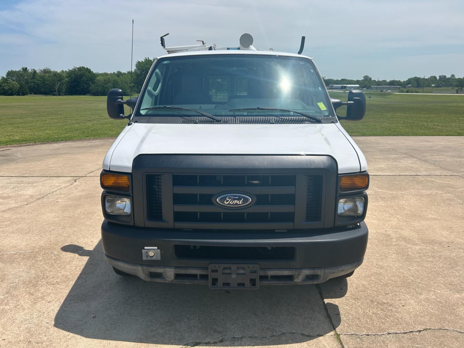 2011 White Ford E-Series Van E-250 (1FTNE2EL5BD) with an 5.4L V8 SOHC 16V engine, 4-Speed Automatic transmission, located at 17760 Hwy 62, Morris, OK, 74445, (918) 733-4887, 35.609104, -95.877060 - 2011 FORD E-SERIES VAN E-250 5.4 V8 DEDICATED CNG (COMPRESSED NATURAL GAS) DOES NOT RUN ON GASOLINE. THE FORD E-SERIES VAN FEATURES MANUAL SEATS, MANUAL LOCKS, MANUAL WINDOWS, MANUAL MIRRORS, FRONT HEAT AND AIR, AM/FM RADIO, LEATHER SEATS, STEEL SHELVES, SPLIT SWING-OUT RIGHT DOORS, AND PLENTY OF SP - Photo #2