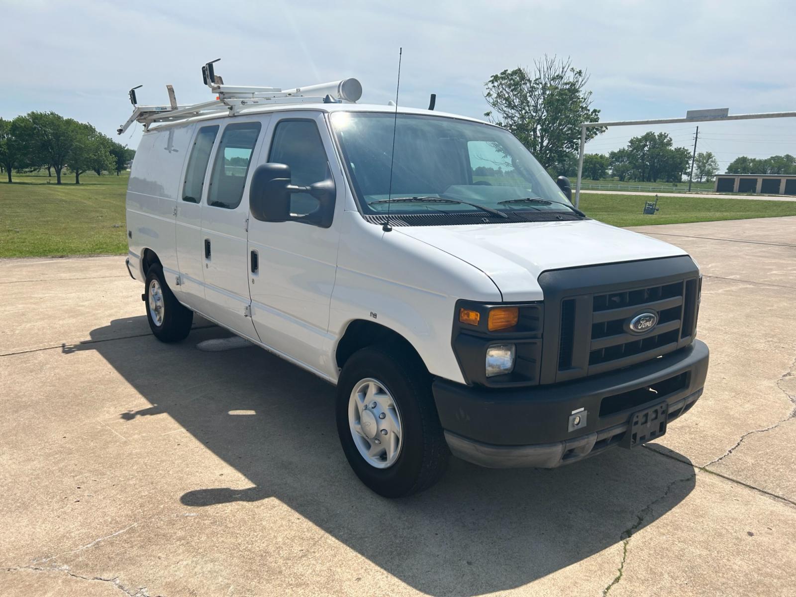 2011 White Ford E-Series Van E-250 (1FTNE2EL5BD) with an 5.4L V8 SOHC 16V engine, 4-Speed Automatic transmission, located at 17760 Hwy 62, Morris, OK, 74445, (918) 733-4887, 35.609104, -95.877060 - 2011 FORD E-SERIES VAN E-250 5.4 V8 DEDICATED CNG (COMPRESSED NATURAL GAS) DOES NOT RUN ON GASOLINE. THE FORD E-SERIES VAN FEATURES MANUAL SEATS, MANUAL LOCKS, MANUAL WINDOWS, MANUAL MIRRORS, FRONT HEAT AND AIR, AM/FM RADIO, LEATHER SEATS, STEEL SHELVES, SPLIT SWING-OUT RIGHT DOORS, AND PLENTY OF SP - Photo #3