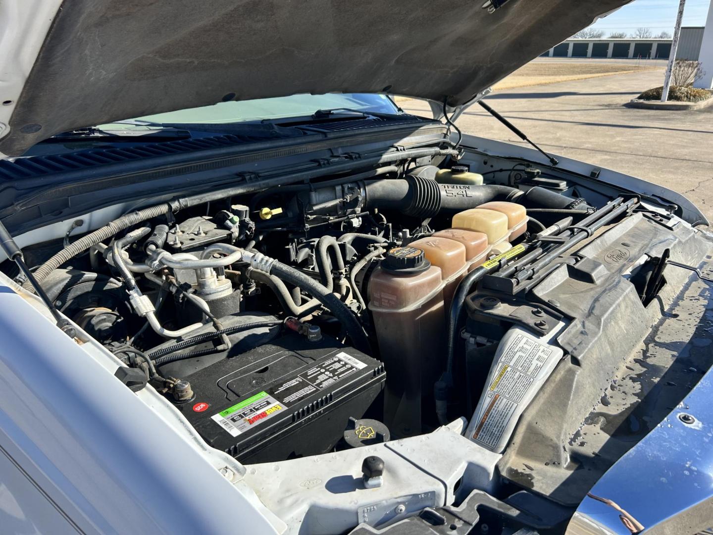 2000 White /TAN Ford Excursion XLT 2WD (1FMNU40L4YE) with an 5.4L V8 SOHC 16V engine, 4-Speed Automatic Overdrive transmission, located at 17760 Hwy 62, Morris, OK, 74445, (918) 733-4887, 35.609104, -95.877060 - 2000 FORD EXCURSION IS 5.4L V8 RWD FEATURING POWER LOCKS, POWER WINDOWS, POWER SEATS, POWER MIRRORS, AM/FM STEREO, CD PLAYER, CASSETTE PLAYER, 6 DISC COMPACT MAGAZINE, REAR CLIMATE CONTROL, CRUISE CONTROL, 3RD ROW SEATING. TIRES LT265/75R16 TIRES. 126,953 MILES WITH A REBUILT TITLE DUE TO AN ACCIDEN - Photo#21