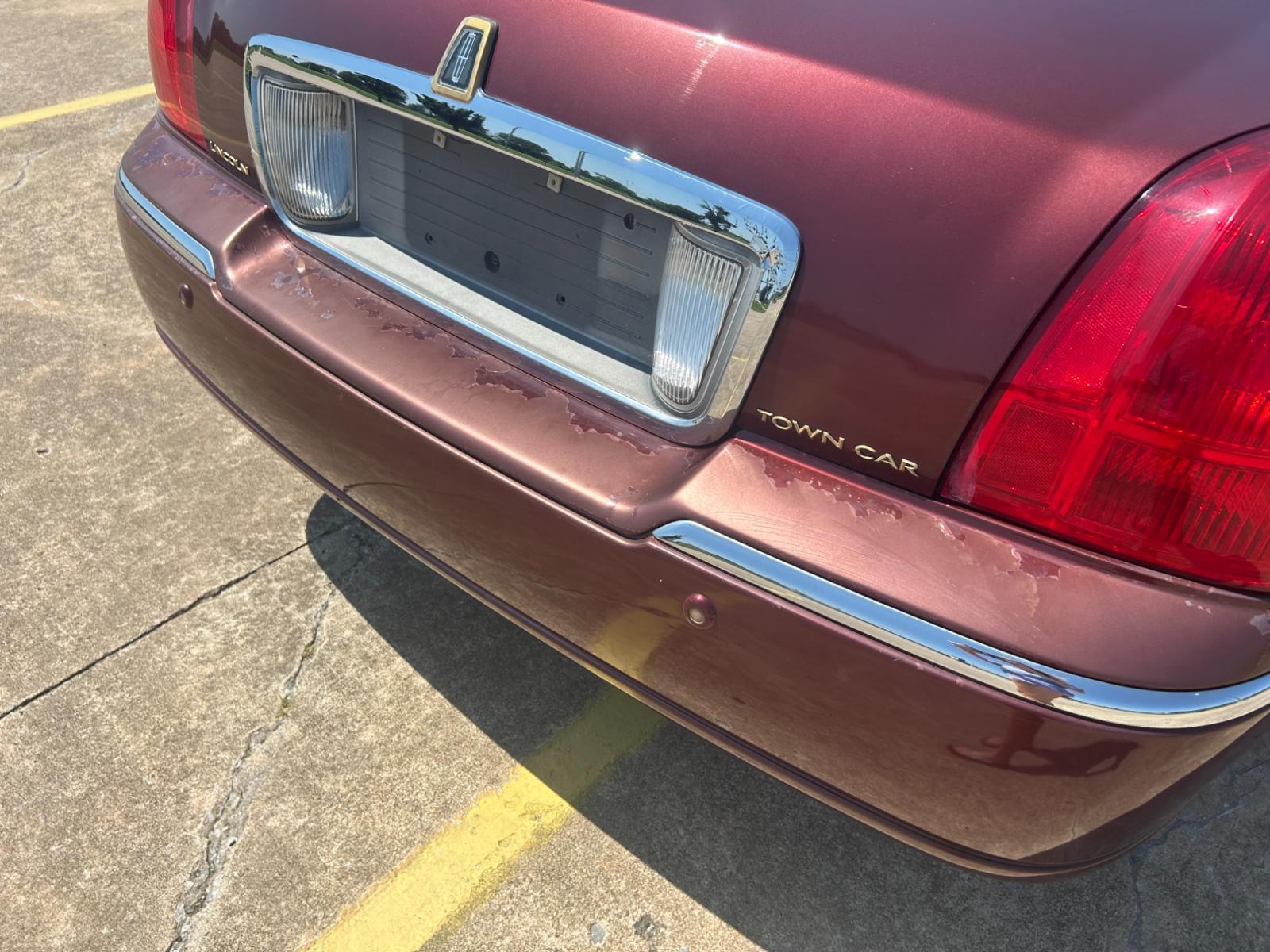 2004 RED Lincoln Town Car Ultimate (1LNHM83W24Y) with an 4.6L V8 SOHC 16V engine, 4-Speed Automatic Overdrive transmission, located at 17760 Hwy 62, Morris, OK, 74445, (918) 733-4887, 35.609104, -95.877060 - 2004 LINCOLN TOWN CAR HAS A 4.6L V8. FEATURES POWER LOCKS, POWER WINDOWS, POWER MIRRORS, POWER SEATS, POWER ADJUSTABLE FOOT PEDAL, AM/FM STEREO, CD PLAYER, CASSETTE PLAYER, LEATHER SEATS, DUAL CLIMATE CONTROL, CRUISE CONTROL, HEATED SEATS, FRONT AND REAR DEFROST, FIRESTONE 225/50R17 TIRES, 156,071 M - Photo #28