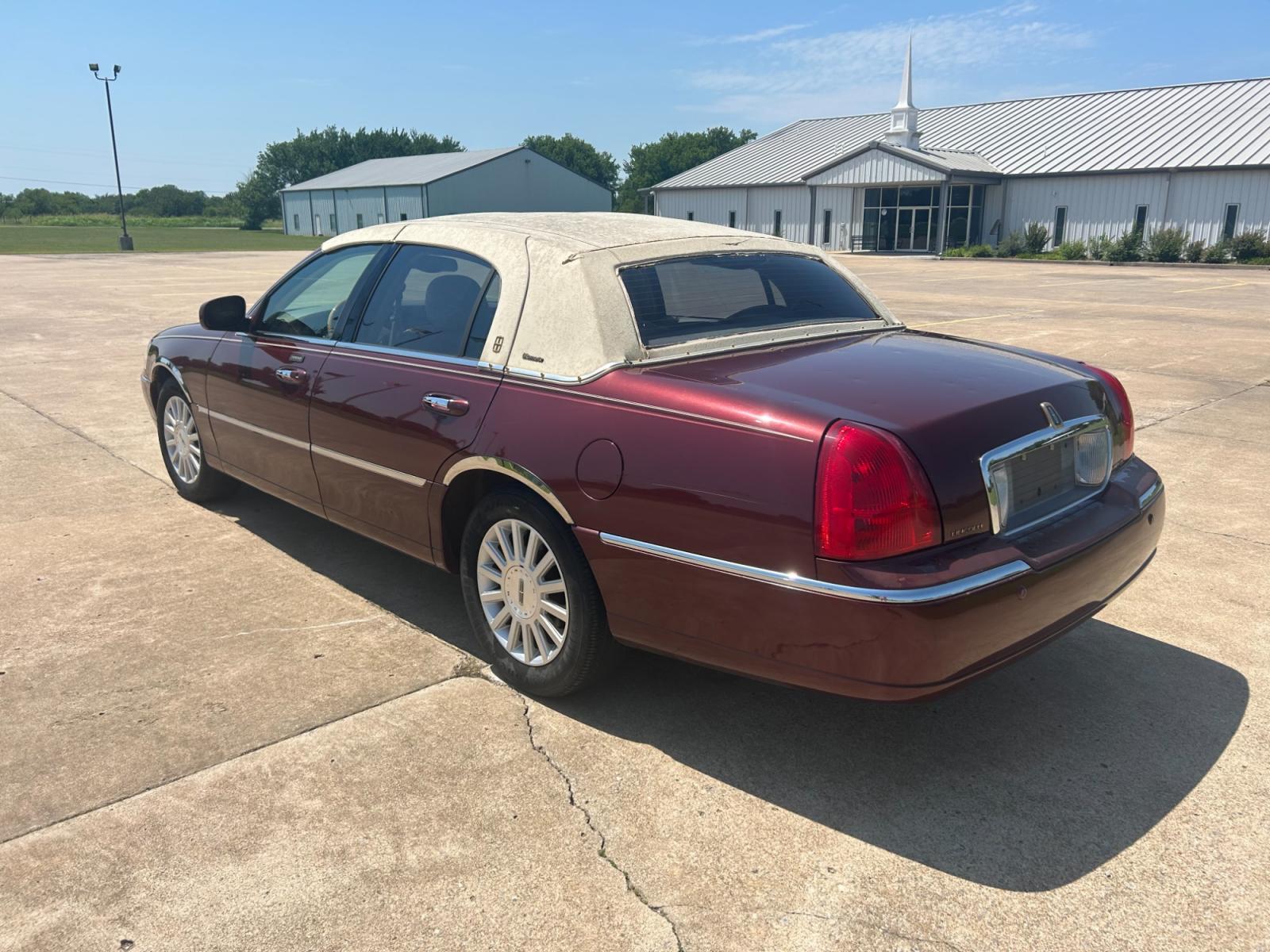 2004 RED Lincoln Town Car Ultimate (1LNHM83W24Y) with an 4.6L V8 SOHC 16V engine, 4-Speed Automatic Overdrive transmission, located at 17760 Hwy 62, Morris, OK, 74445, (918) 733-4887, 35.609104, -95.877060 - 2004 LINCOLN TOWN CAR HAS A 4.6L V8. FEATURES POWER LOCKS, POWER WINDOWS, POWER MIRRORS, POWER SEATS, POWER ADJUSTABLE FOOT PEDAL, AM/FM STEREO, CD PLAYER, CASSETTE PLAYER, LEATHER SEATS, DUAL CLIMATE CONTROL, CRUISE CONTROL, HEATED SEATS, FRONT AND REAR DEFROST, FIRESTONE 225/50R17 TIRES, 156,071 M - Photo #7
