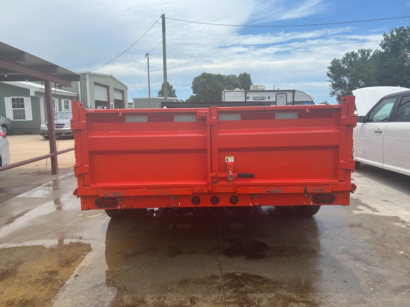 2023 ORANGE EAST TEXAS TRAILER DUMPBED (58SBD1627PE) , located at 17760 Hwy 62, Morris, OK, 74445, 35.609104, -95.877060 - 2023 EAST TEXAS DUMP BED TRAILER IS 16X83, 14,000 GVWR, 2-7000 LB DEXTER ELECTRIC BREAK SYSTEM, TONGUE MOUNTED TOOL BOX, 7 GA FLOOR, 80" SLIDE IN RAMPS, 7 WAY PLUG, LED LIGHTS, 24" HIGH 10 GA. SIDES, 6" 12 LB I-BEAM FRAME, 6" 12 LB I-BEAM TONGUE. TITLE IN HAND. TRAILER IS BASICALLY NEW AND HAS ONLY - Photo #2