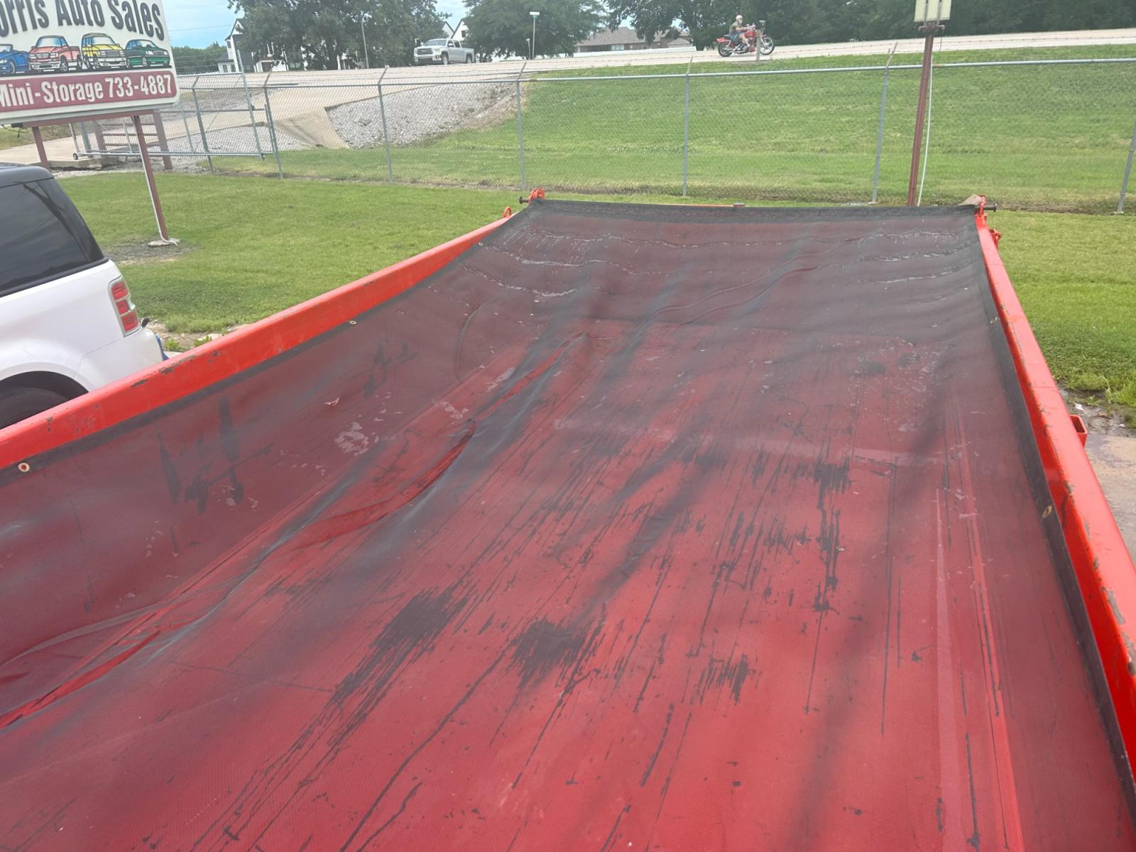 2023 ORANGE EAST TEXAS TRAILER DUMPBED (58SBD1627PE) , located at 17760 Hwy 62, Morris, OK, 74445, 35.609104, -95.877060 - 2023 EAST TEXAS DUMP BED TRAILER IS 16X83, 14,000 GVWR, 2-7000 LB DEXTER ELECTRIC BREAK SYSTEM, TONGUE MOUNTED TOOL BOX, 7 GA FLOOR, 80" SLIDE IN RAMPS, 7 WAY PLUG, LED LIGHTS, 24" HIGH 10 GA. SIDES, 6" 12 LB I-BEAM FRAME, 6" 12 LB I-BEAM TONGUE. TITLE IN HAND. TRAILER IS BASICALLY NEW AND HAS ONLY - Photo #7