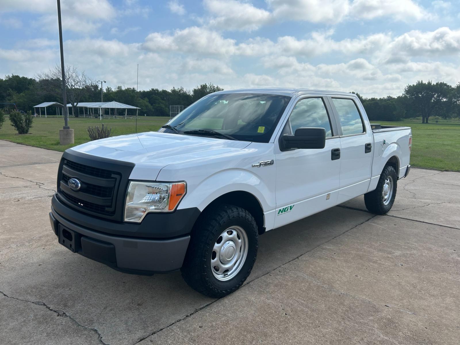 2014 Ford F-150 XLT SuperCrew 5.5-ft. Bed 2WD (1FTEW1CM2EK) with an 3.7L V6 engine, 6-Speed Automatic transmission, located at 17760 Hwy 62, Morris, OK, 74445, (918) 733-4887, 35.609104, -95.877060 - 2014 FORD F-150 XLT SUPERCREW 5.5-ft. BED 2WD IS A BI-FUEL TRUCK THAT RUNS ON BOTH CNG (COMPRESSED NATURAL GAS) OR GASOLINE. IT FEATURES POWER LOCKS, POWER WINDOWS, POWER MIRRORS, AM/FM STEREO, CRUISE CONTROL, TRACTION CONTROL, BED LINER. A PREMIER ALTERNATIVE FUEL THAT IS EPA-APPROVED. EXTREMELY CL - Photo #0