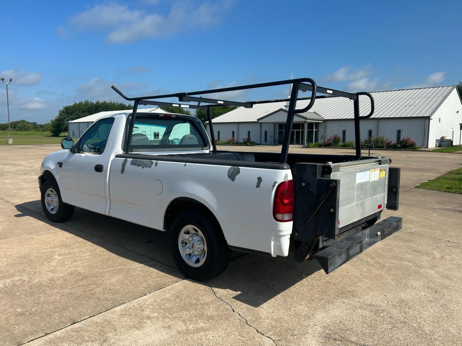 2001 Ford F-150 XL Long Bed 2WD (1FTPF17M01K) with an 5.4L V8 SOHC 16V engine, located at 17760 Hwy 62, Morris, OK, 74445, (918) 733-4887, 35.609104, -95.877060 - 2001 FORD F-150 XL LONG BED 2WD DEDICATED CNG (ONLY RUNS ON COMPRESSED NATURAL GAS) ($1.47 PER GALLON!). IT FEATURES LIFT GATE, MANUAL SEATS, MANUAL LOCKS, MANUAL WINDOWS, MANUAL MIRRORS, AM/FM STEREO, CASSETTE PLAYER, BED LINER. A PREMIER ALTERNATIVE FUEL CONVERSION THAT IS EPA-APPROVED. EXTREMELY - Photo #6