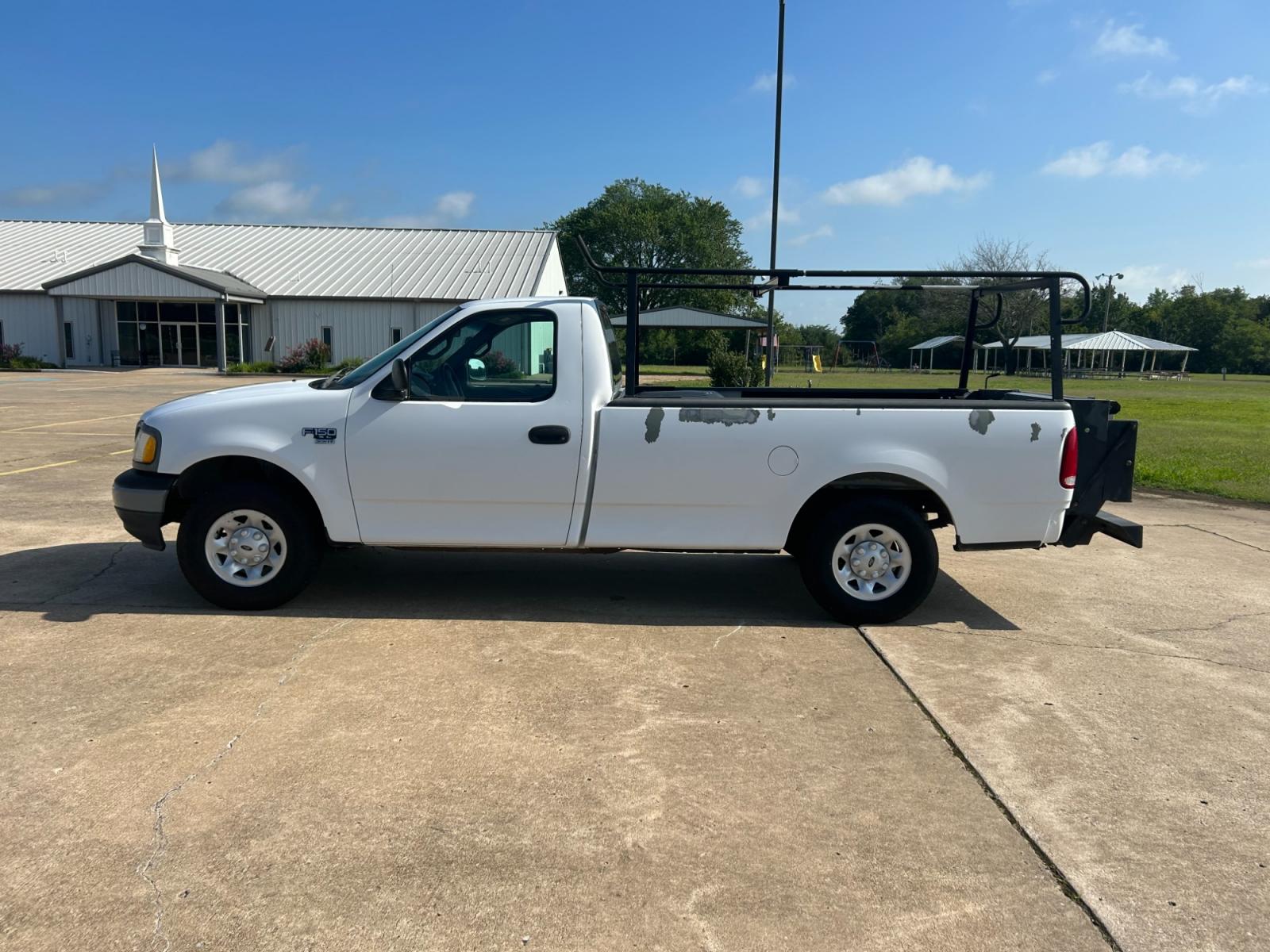 2001 Ford F-150 XL Long Bed 2WD (1FTPF17M01K) with an 5.4L V8 SOHC 16V engine, located at 17760 Hwy 62, Morris, OK, 74445, (918) 733-4887, 35.609104, -95.877060 - 2001 FORD F-150 XL LONG BED 2WD DEDICATED CNG (ONLY RUNS ON COMPRESSED NATURAL GAS) ($1.47 PER GALLON!). IT FEATURES LIFT GATE, MANUAL SEATS, MANUAL LOCKS, MANUAL WINDOWS, MANUAL MIRRORS, AM/FM STEREO, CASSETTE PLAYER, BED LINER. A PREMIER ALTERNATIVE FUEL CONVERSION THAT IS EPA-APPROVED. EXTREMELY - Photo #7