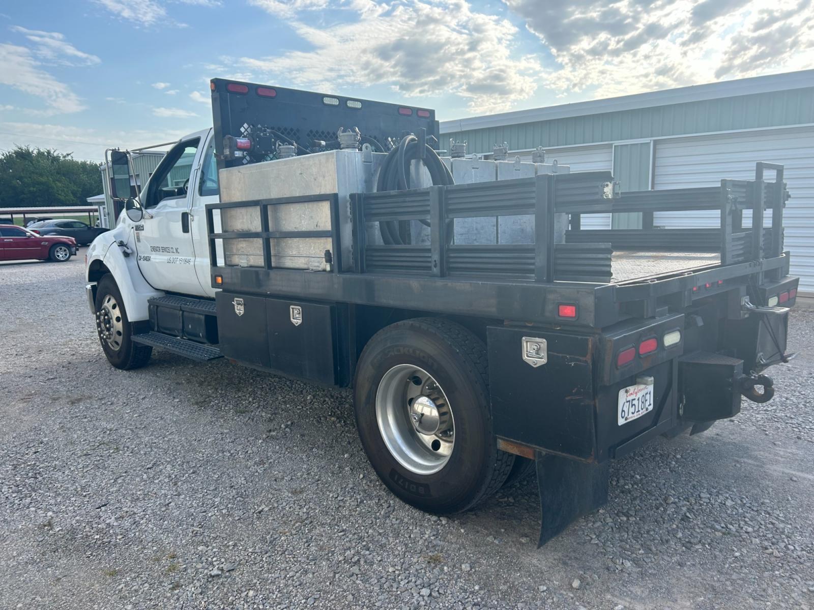 2008 White Ford F-750 SuperCab 2WD DRW (3FRXX75G68V) with an 7.2L L6 DIESEL engine, AUTOMATIC transmission, located at 17760 Hwy 62, Morris, OK, 74445, (918) 733-4887, 35.609104, -95.877060 - 2008 FORD F-750 HAS THE 7.2L ENGINE. THIS TRUCK RUNS ON DIESEL ONLY. FEATURES POWER LOCKS, POWER WINDOWS, MANUAL SEATS, AM/FM STEREO, CD PLAYER, LEATHER SEATS, CUSTOM BED, WITH LOTS OF STORAGE 233,874 MILES WITH A CLEAN TITLE AND FREE CARFAX REPORT $29,500 CALL RUSS OR JONA AT 918-733-4887 - Photo #5