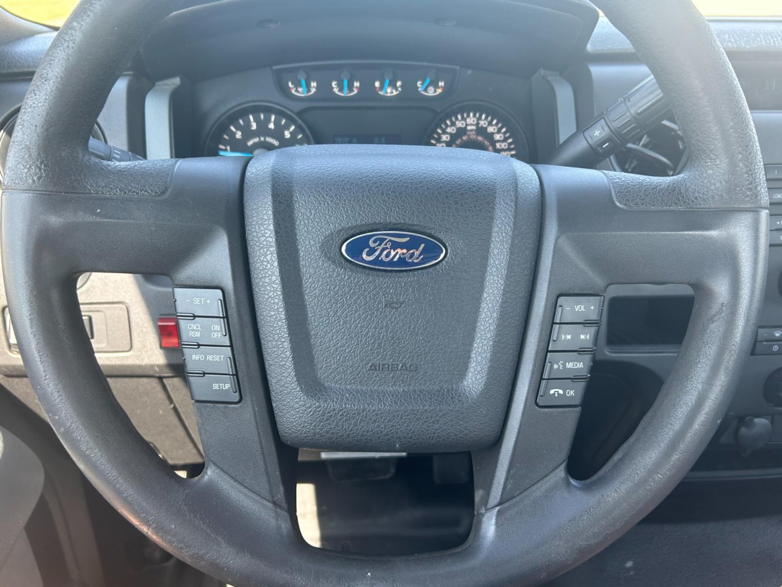 2014 Ford F-150 (1FTMF1CM3EK) with an 6.2L V8 OHV 16V engine, AUTOMATIC transmission, located at 17760 Hwy 62, Morris, OK, 74445, (918) 733-4887, 35.609104, -95.877060 - 2014 FORD F-150 HAS THE 6.2L V8 AND IS RWD. FEATURES POWER LOCKS, POWER WINDOWS, POWER MIRRORS, AM/FM STEREO, SIRIUS STEREO CD PLAYER, AUXILLARY PORT, BACK-UP CAMERA, BED LINER, CRUISE CONTROL, TRACTION CONTROL, MULTI-FUNCTION STEERING CONTROL. A PREMIER ALTERNATIVE FUEL CONVERSION THAT IS EPA-APP - Photo #13