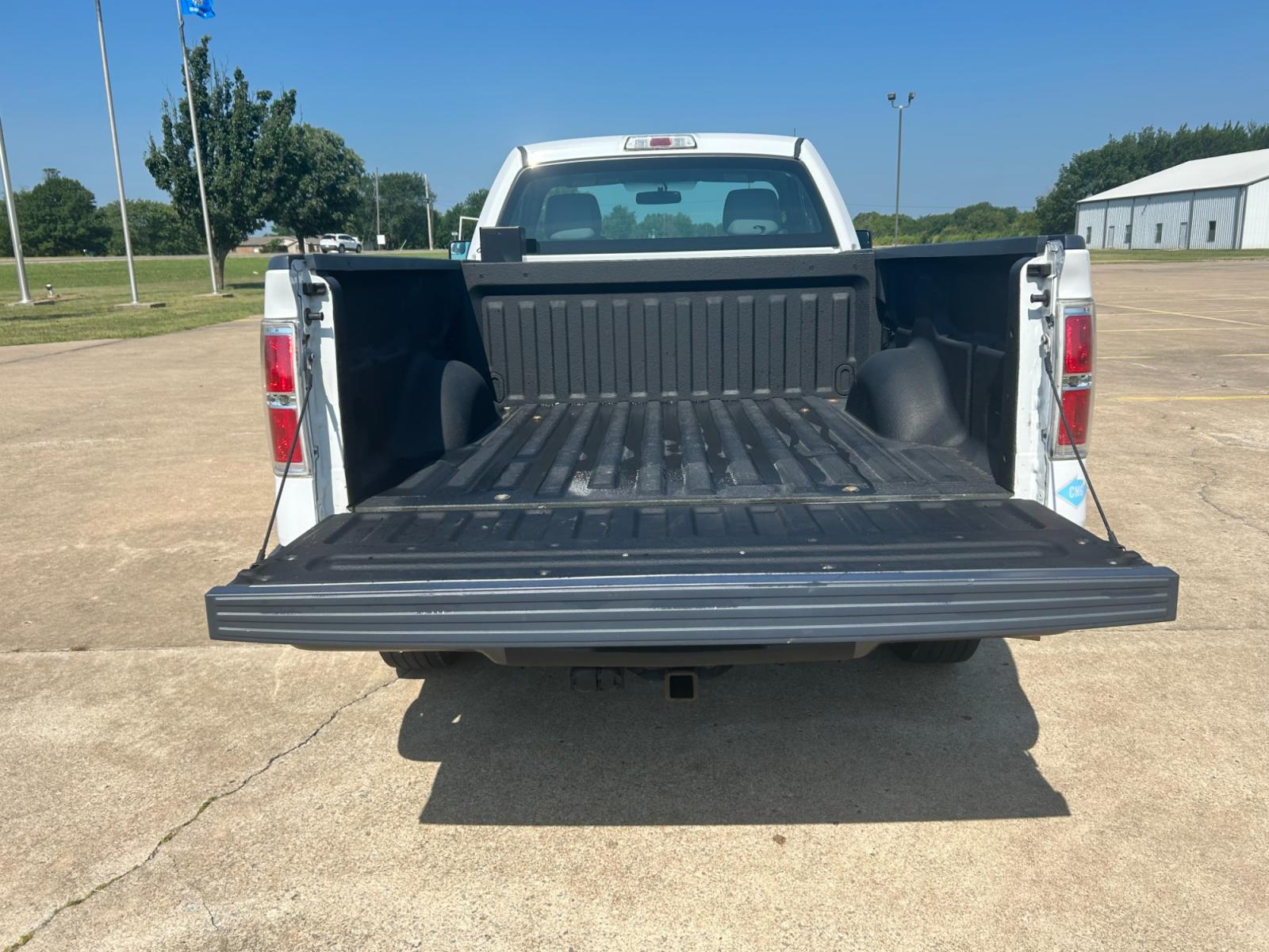 2014 Ford F-150 (1FTMF1CM3EK) with an 6.2L V8 OHV 16V engine, AUTOMATIC transmission, located at 17760 Hwy 62, Morris, OK, 74445, (918) 733-4887, 35.609104, -95.877060 - 2014 FORD F-150 HAS THE 6.2L V8 AND IS RWD. FEATURES POWER LOCKS, POWER WINDOWS, POWER MIRRORS, AM/FM STEREO, SIRIUS STEREO CD PLAYER, AUXILLARY PORT, BACK-UP CAMERA, BED LINER, CRUISE CONTROL, TRACTION CONTROL, MULTI-FUNCTION STEERING CONTROL. A PREMIER ALTERNATIVE FUEL CONVERSION THAT IS EPA-APP - Photo #16