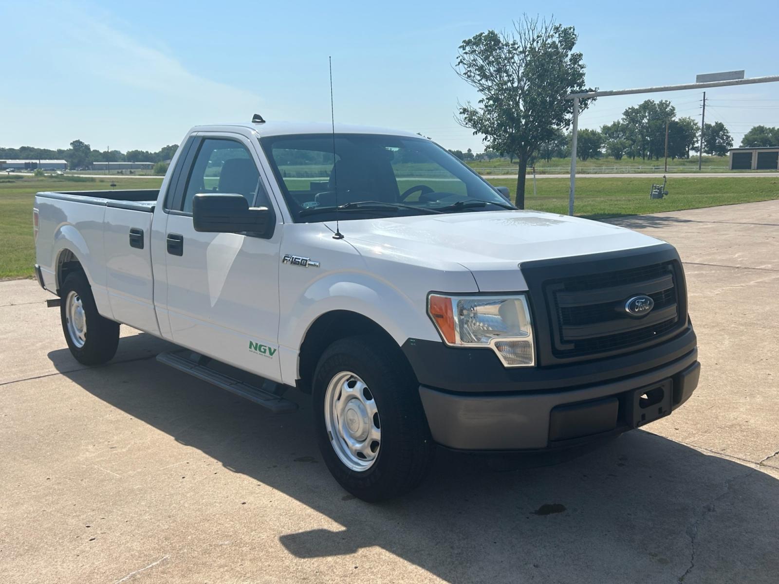 2014 Ford F-150 (1FTMF1CM3EK) with an 6.2L V8 OHV 16V engine, AUTOMATIC transmission, located at 17760 Hwy 62, Morris, OK, 74445, (918) 733-4887, 35.609104, -95.877060 - 2014 FORD F-150 HAS THE 6.2L V8 AND IS RWD. FEATURES POWER LOCKS, POWER WINDOWS, POWER MIRRORS, AM/FM STEREO, SIRIUS STEREO CD PLAYER, AUXILLARY PORT, BACK-UP CAMERA, BED LINER, CRUISE CONTROL, TRACTION CONTROL, MULTI-FUNCTION STEERING CONTROL. A PREMIER ALTERNATIVE FUEL CONVERSION THAT IS EPA-APP - Photo #2