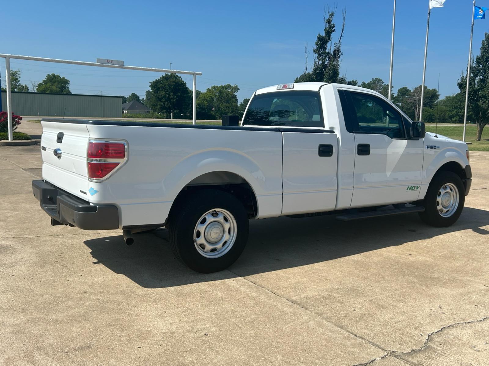 2014 Ford F-150 (1FTMF1CM3EK) with an 6.2L V8 OHV 16V engine, AUTOMATIC transmission, located at 17760 Hwy 62, Morris, OK, 74445, (918) 733-4887, 35.609104, -95.877060 - 2014 FORD F-150 HAS THE 6.2L V8 AND IS RWD. FEATURES POWER LOCKS, POWER WINDOWS, POWER MIRRORS, AM/FM STEREO, SIRIUS STEREO CD PLAYER, AUXILLARY PORT, BACK-UP CAMERA, BED LINER, CRUISE CONTROL, TRACTION CONTROL, MULTI-FUNCTION STEERING CONTROL. A PREMIER ALTERNATIVE FUEL CONVERSION THAT IS EPA-APP - Photo #4