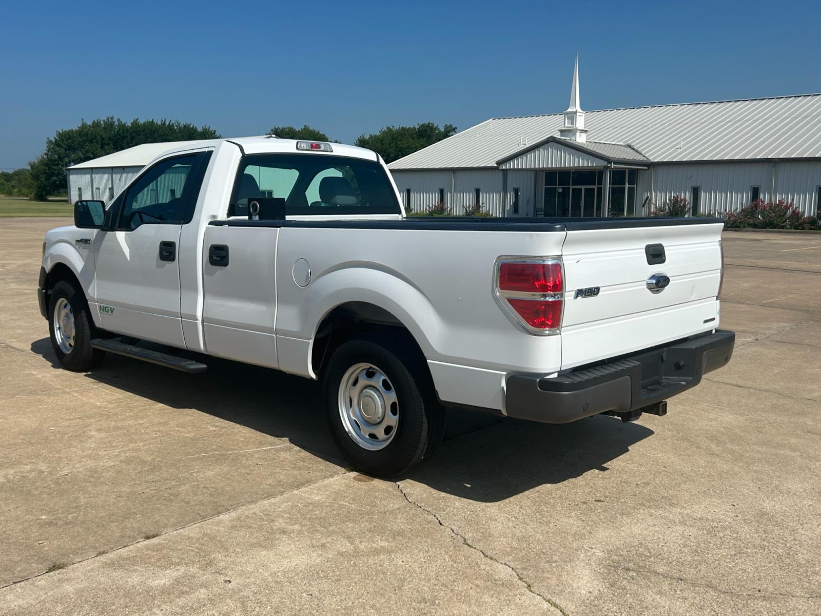 2014 Ford F-150 (1FTMF1CM3EK) with an 6.2L V8 OHV 16V engine, AUTOMATIC transmission, located at 17760 Hwy 62, Morris, OK, 74445, (918) 733-4887, 35.609104, -95.877060 - 2014 FORD F-150 HAS THE 6.2L V8 AND IS RWD. FEATURES POWER LOCKS, POWER WINDOWS, POWER MIRRORS, AM/FM STEREO, SIRIUS STEREO CD PLAYER, AUXILLARY PORT, BACK-UP CAMERA, BED LINER, CRUISE CONTROL, TRACTION CONTROL, MULTI-FUNCTION STEERING CONTROL. A PREMIER ALTERNATIVE FUEL CONVERSION THAT IS EPA-APP - Photo #6