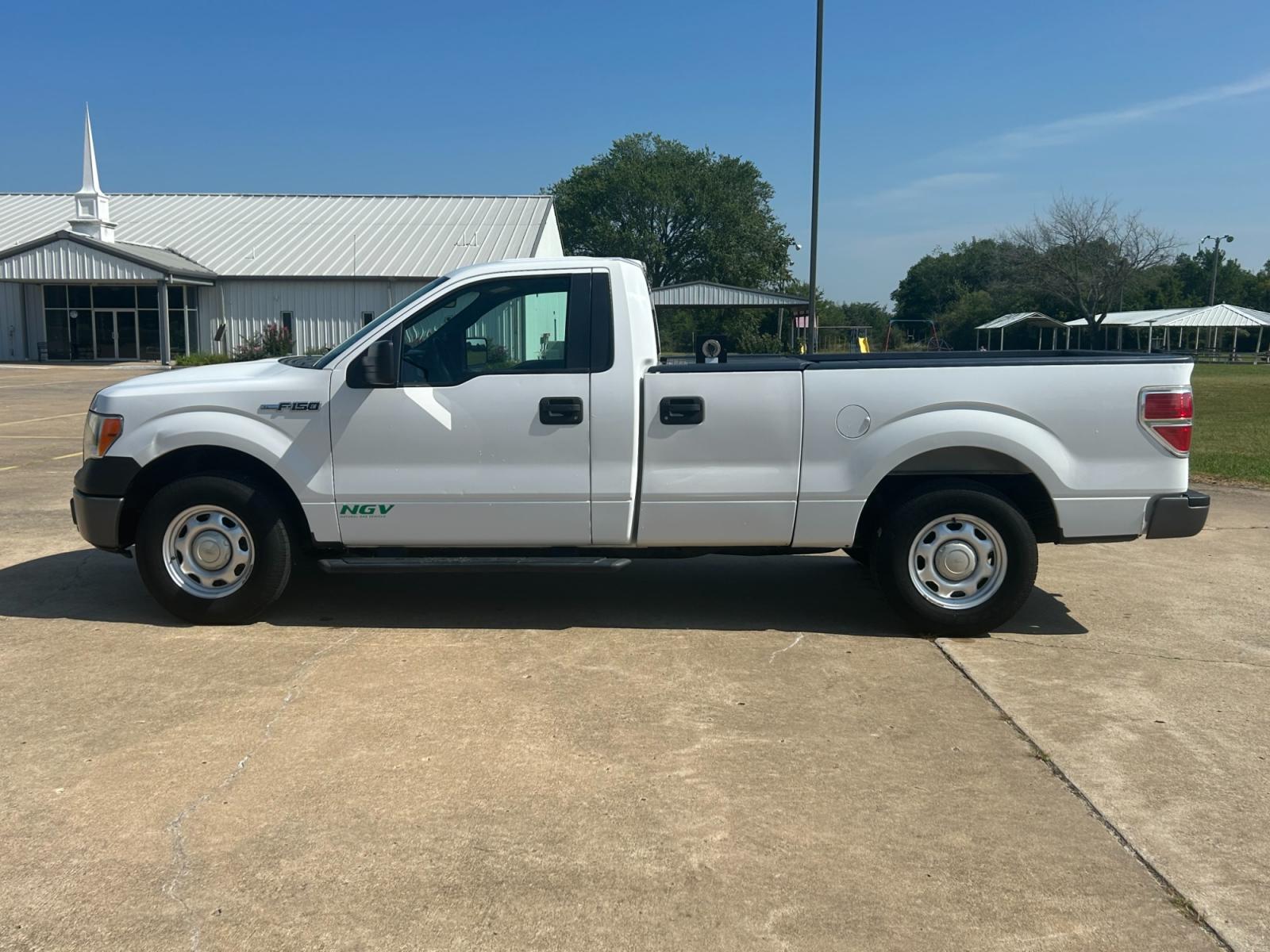 2014 Ford F-150 (1FTMF1CM3EK) with an 6.2L V8 OHV 16V engine, AUTOMATIC transmission, located at 17760 Hwy 62, Morris, OK, 74445, (918) 733-4887, 35.609104, -95.877060 - 2014 FORD F-150 HAS THE 6.2L V8 AND IS RWD. FEATURES POWER LOCKS, POWER WINDOWS, POWER MIRRORS, AM/FM STEREO, SIRIUS STEREO CD PLAYER, AUXILLARY PORT, BACK-UP CAMERA, BED LINER, CRUISE CONTROL, TRACTION CONTROL, MULTI-FUNCTION STEERING CONTROL. A PREMIER ALTERNATIVE FUEL CONVERSION THAT IS EPA-APP - Photo #7