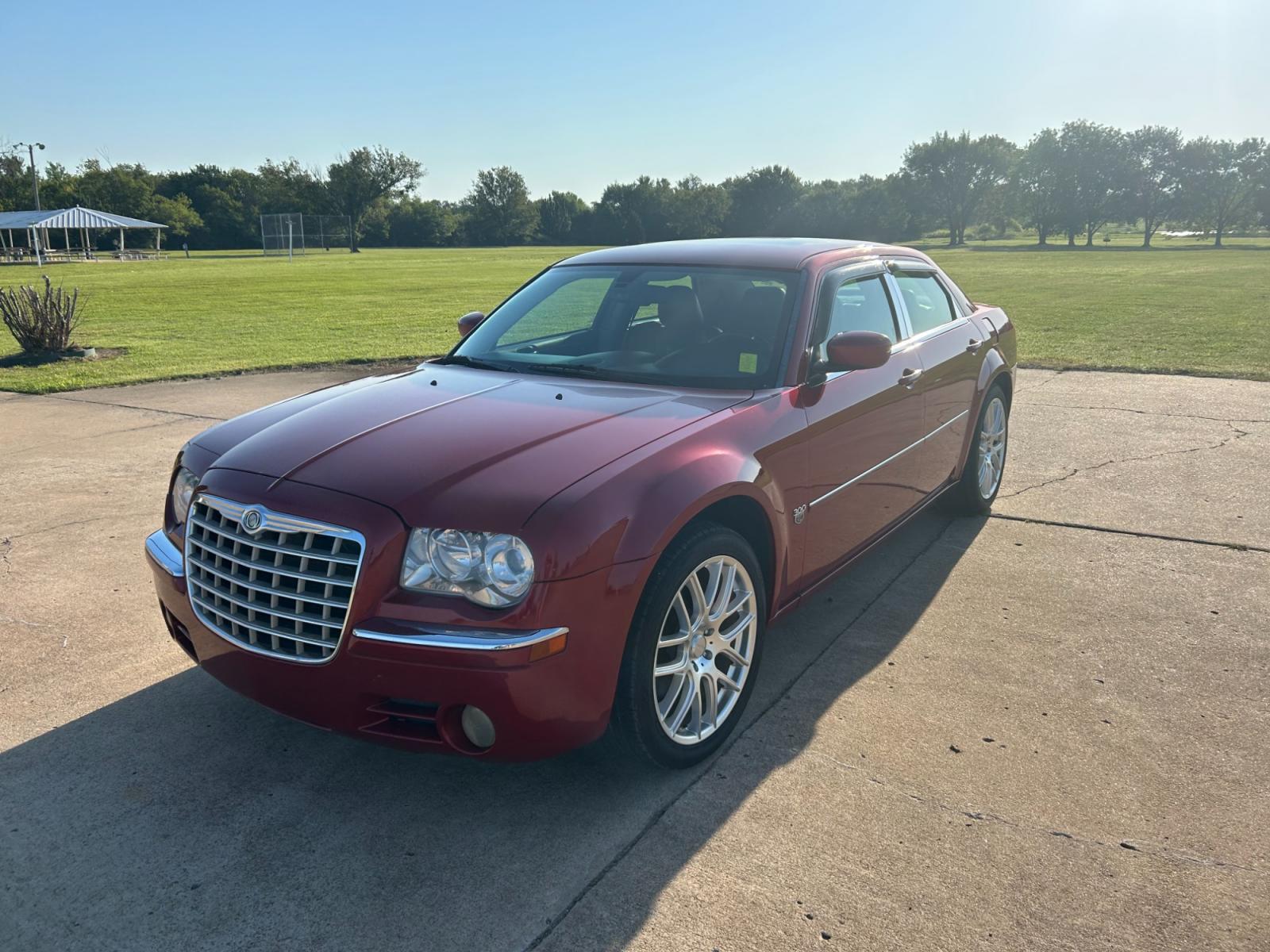 2007 RED Chrysler 300 C (2C3KA63H07H) with an 5.7L V8 OHV 16V engine, 5-Speed Automatic Overdrive transmission, located at 17760 Hwy 62, Morris, OK, 74445, (918) 733-4887, 35.609104, -95.877060 - 2007 CHRYSLER 300 C HAS A 5.7L V8 OHV 16V WITH RWD. FEATURES POWER SEATS, POWER LOCKS, POWER WINDOWS, POWER MIRRORS, AM/FM STEREO, CD PLAYER, CASSETTE PLAYER, HEATED SEATS, LEATHER SEATS, DUAL CLIMATE CONTROL, MULTIFUNCTION STEERING WHEEL CONTROLS, SUNROOF, FREE CARFAX REPORT. 170,490 MILES WITH 245 - Photo #1