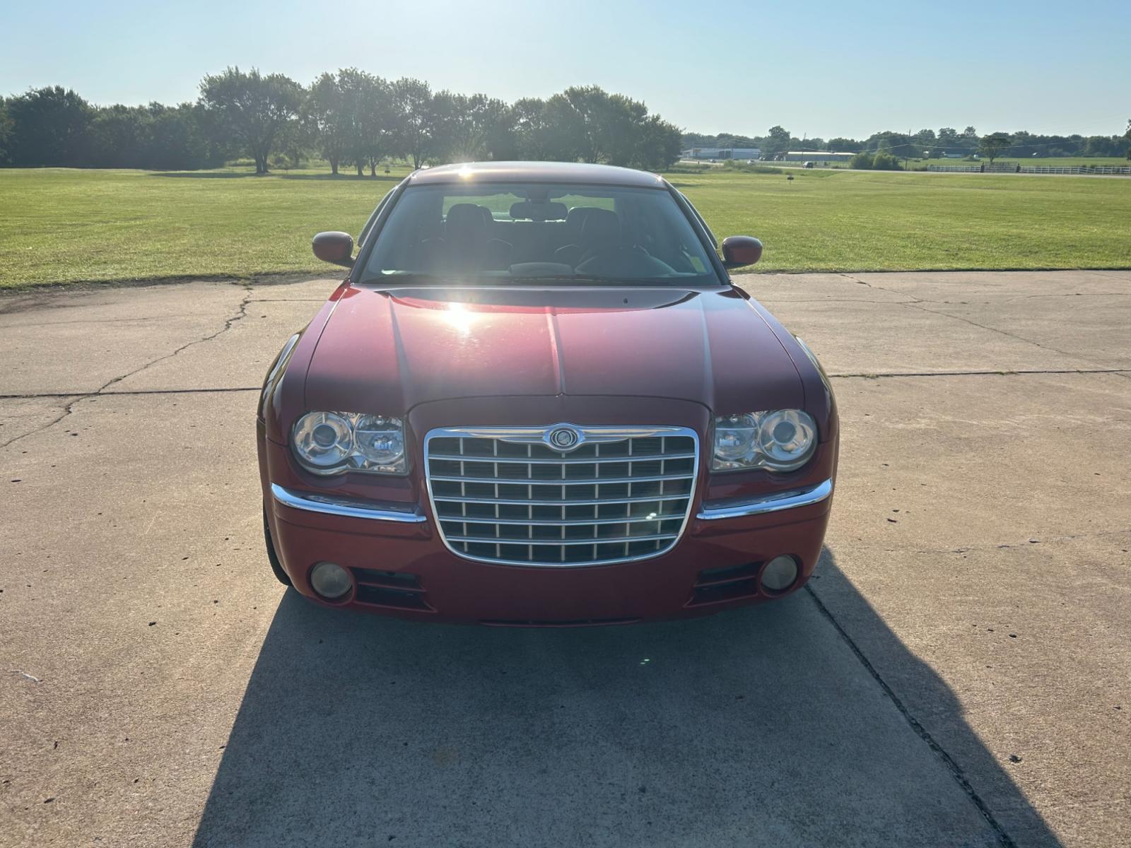 2007 RED Chrysler 300 C (2C3KA63H07H) with an 5.7L V8 OHV 16V engine, 5-Speed Automatic Overdrive transmission, located at 17760 Hwy 62, Morris, OK, 74445, (918) 733-4887, 35.609104, -95.877060 - 2007 CHRYSLER 300 C HAS A 5.7L V8 OHV 16V WITH RWD. FEATURES POWER SEATS, POWER LOCKS, POWER WINDOWS, POWER MIRRORS, AM/FM STEREO, CD PLAYER, CASSETTE PLAYER, HEATED SEATS, LEATHER SEATS, DUAL CLIMATE CONTROL, MULTIFUNCTION STEERING WHEEL CONTROLS, SUNROOF, FREE CARFAX REPORT. 170,490 MILES WITH 245 - Photo #2