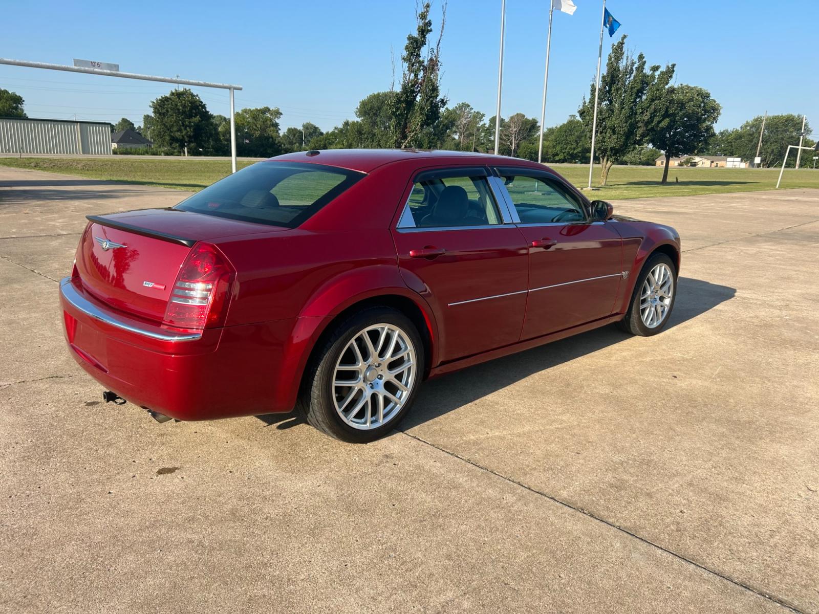 2007 RED Chrysler 300 C (2C3KA63H07H) with an 5.7L V8 OHV 16V engine, 5-Speed Automatic Overdrive transmission, located at 17760 Hwy 62, Morris, OK, 74445, (918) 733-4887, 35.609104, -95.877060 - 2007 CHRYSLER 300 C HAS A 5.7L V8 OHV 16V WITH RWD. FEATURES POWER SEATS, POWER LOCKS, POWER WINDOWS, POWER MIRRORS, AM/FM STEREO, CD PLAYER, CASSETTE PLAYER, HEATED SEATS, LEATHER SEATS, DUAL CLIMATE CONTROL, MULTIFUNCTION STEERING WHEEL CONTROLS, SUNROOF, FREE CARFAX REPORT. 170,490 MILES WITH 245 - Photo #5