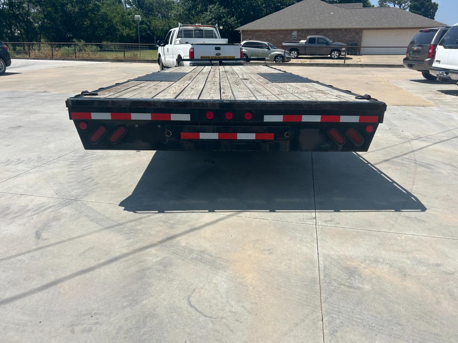 2022 BLACK Norstar Trailers IRONBULL (50HFP2426N1) , located at 17760 Hwy 62, Morris, OK, 74445, 35.609104, -95.877060 - 2022 IRONBULL TRAILER FEATURES 10" I-BEAM FRAME AND TONGUE, 2 5/16'' ADJUSTABLE COUPLER, 3'' STRUCTURAL CROSSMEMBERS, DECK HEIGHT 33'', RUB RAIL, STAKE POCKETS, PIPE SPOOLS, CAMBERED SPRING AXLES, MULTI-LEAF SLIPPER SPRING SUSPENSION, E-Z LUBE HUBS, 2 ELECTRIC BREAK AXLES, FULL 93' WIDE DECKOVER, 8 - Photo #3