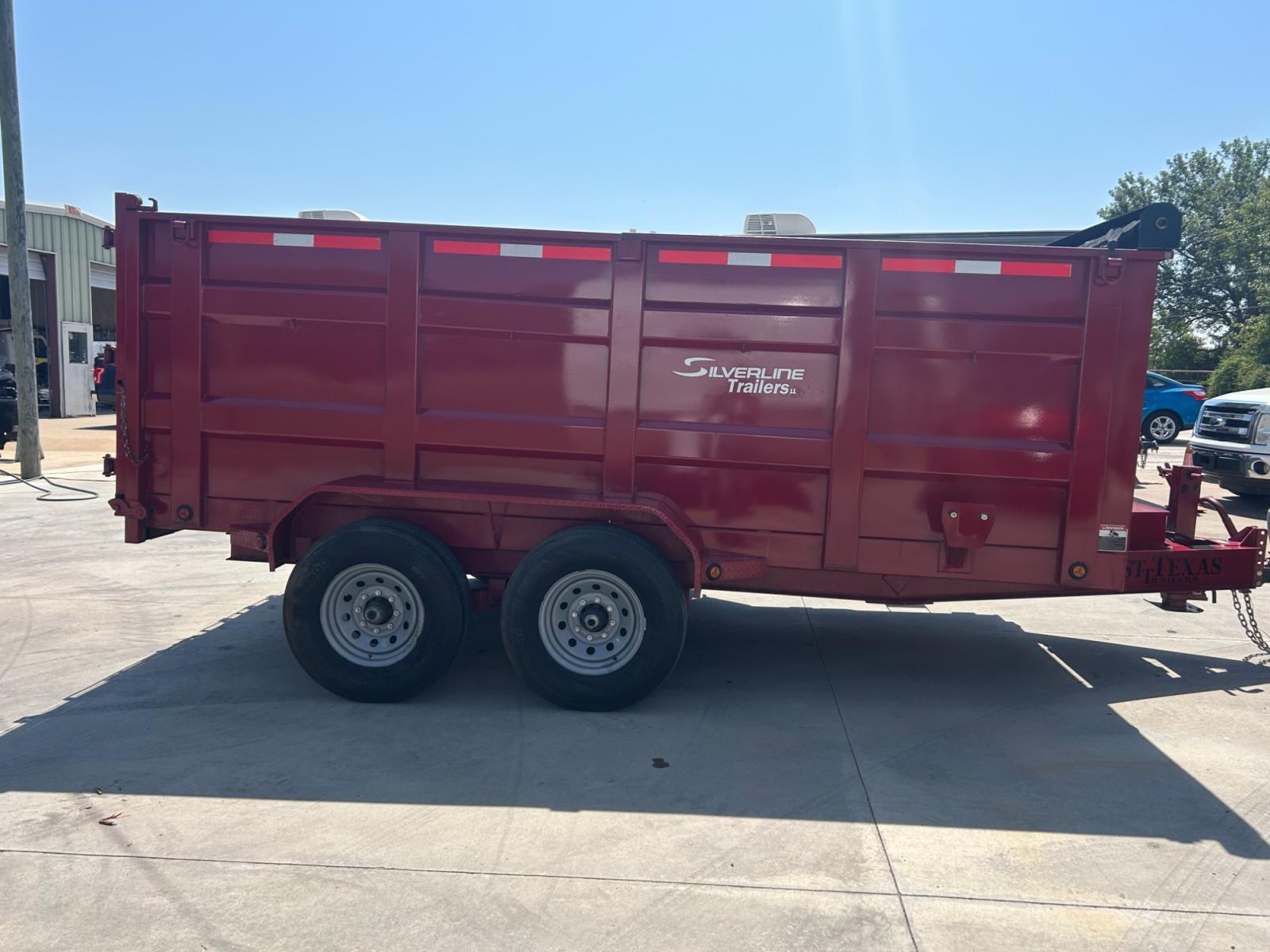 2022 RED EAST TEXAS TRAILER DUMPBED (58SBD1420NE) , located at 17760 Hwy 62, Morris, OK, 74445, 35.609104, -95.877060 - 2022 SILVERLINE TRAILER 83X14 FEATURES 2 7,000 LB DEXTER SPRING AXLES, 2 ELEC FSA BRAKES, COUPLER 2-5/16" ADJUSTABLE (6 HOLE), DIAMOND PLATE FENDERS, 16" CROSS-MEMBERS, 48" DUMP SIDES, 48" 3 WAY GATE, MESH ROLL TARP SYSTEM, JACK SPRING LOADED DROP LEG, 4 3'' D-RINGS, TOOL BOX IN TONGUE, SCISSOR HOIS - Photo #3