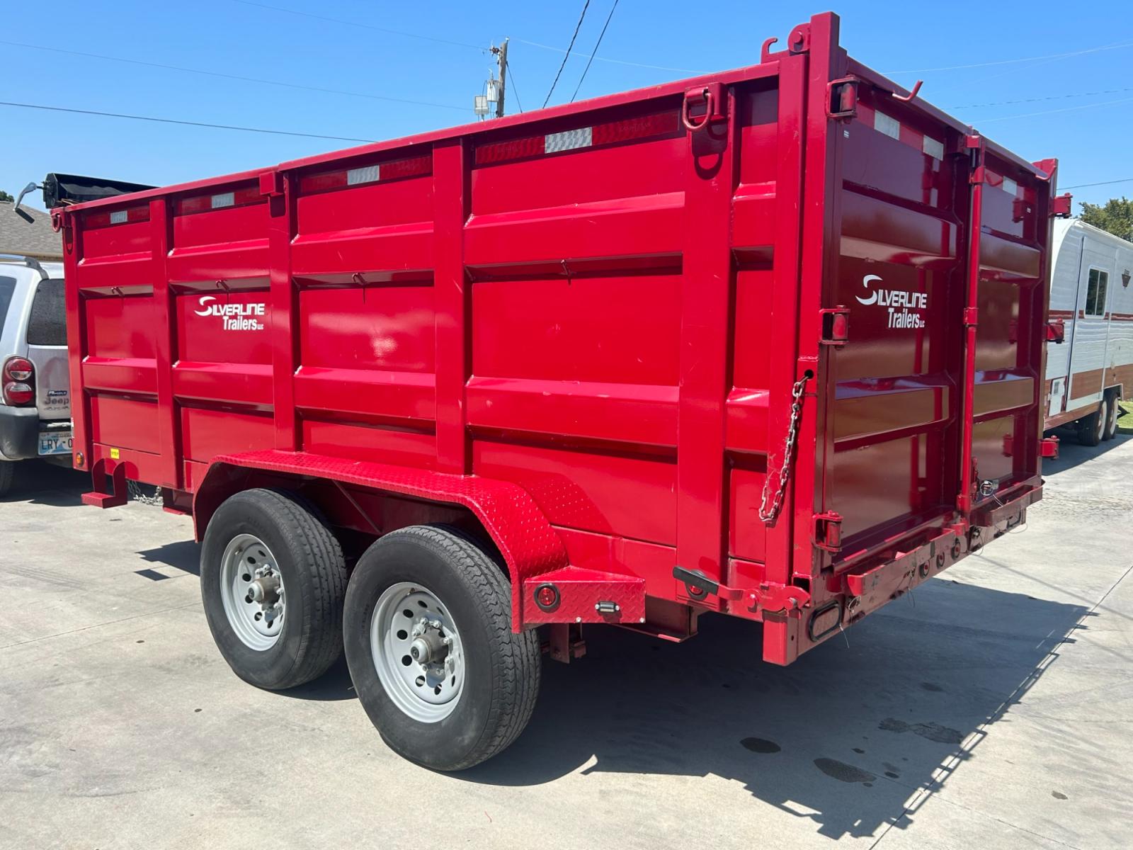 2022 RED EAST TEXAS TRAILER DUMPBED (58SBD1420NE) , located at 17760 Hwy 62, Morris, OK, 74445, 35.609104, -95.877060 - 2022 SILVERLINE TRAILER 83X14 FEATURES 2 7,000 LB DEXTER SPRING AXLES, 2 ELEC FSA BRAKES, COUPLER 2-5/16" ADJUSTABLE (6 HOLE), DIAMOND PLATE FENDERS, 16" CROSS-MEMBERS, 48" DUMP SIDES, 48" 3 WAY GATE, MESH ROLL TARP SYSTEM, JACK SPRING LOADED DROP LEG, 4 3'' D-RINGS, TOOL BOX IN TONGUE, SCISSOR HOIS - Photo #5