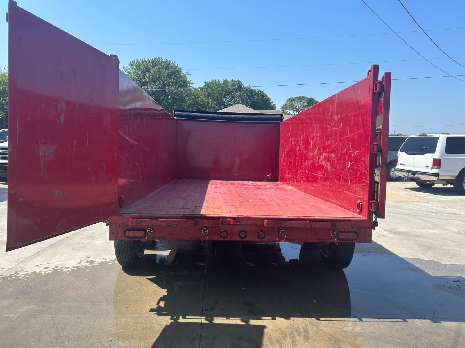 2022 RED EAST TEXAS TRAILER DUMPBED (58SBD1420NE) , located at 17760 Hwy 62, Morris, OK, 74445, 35.609104, -95.877060 - 2022 SILVERLINE TRAILER 83X14 FEATURES 2 7,000 LB DEXTER SPRING AXLES, 2 ELEC FSA BRAKES, COUPLER 2-5/16" ADJUSTABLE (6 HOLE), DIAMOND PLATE FENDERS, 16" CROSS-MEMBERS, 48" DUMP SIDES, 48" 3 WAY GATE, MESH ROLL TARP SYSTEM, JACK SPRING LOADED DROP LEG, 4 3'' D-RINGS, TOOL BOX IN TONGUE, SCISSOR HOIS - Photo #8