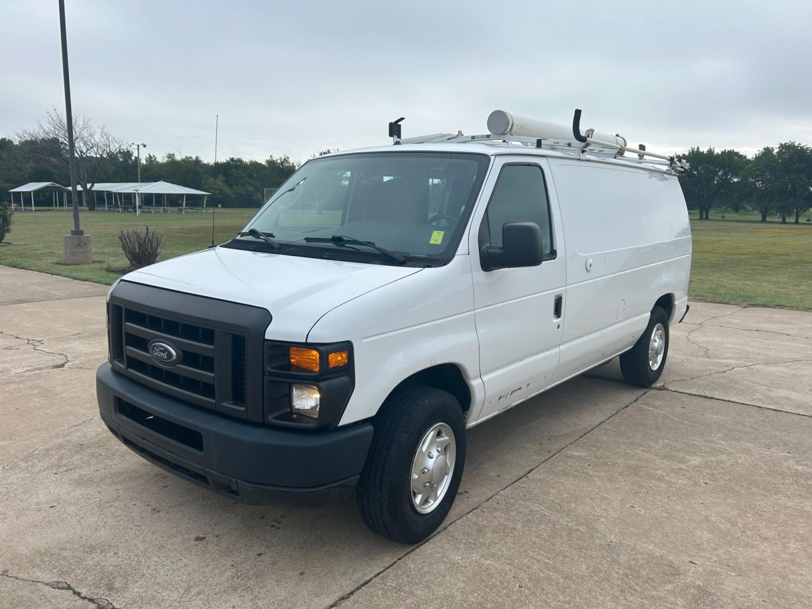 2010 White Ford E-Series Van E-250 (1FTNE2EL9AD) with an 5.4L V8 SOHC 16V engine, 4-Speed Automatic transmission, located at 17760 Hwy 62, Morris, OK, 74445, (918) 733-4887, 35.609104, -95.877060 - 2010 FORD E-SERIES VAN E-250 5.4 V8 DEDICATED CNG (COMPRESSED NATURAL GAS) DOES NOT RUN ON GASOLINE. FEATURES MANUAL SEATS, MANUAL LOCKS, MANUAL WINDOWS, MANUAL MIRRORS, AM/FM STEREO, 1500 WATT INVERTER. IT IS EQUIPPED WITH A CNG FUELING SYSTEM, IT RUNS ON COMPRESSED NATURAL GAS. A PREMIER ALTERNATI - Photo #1