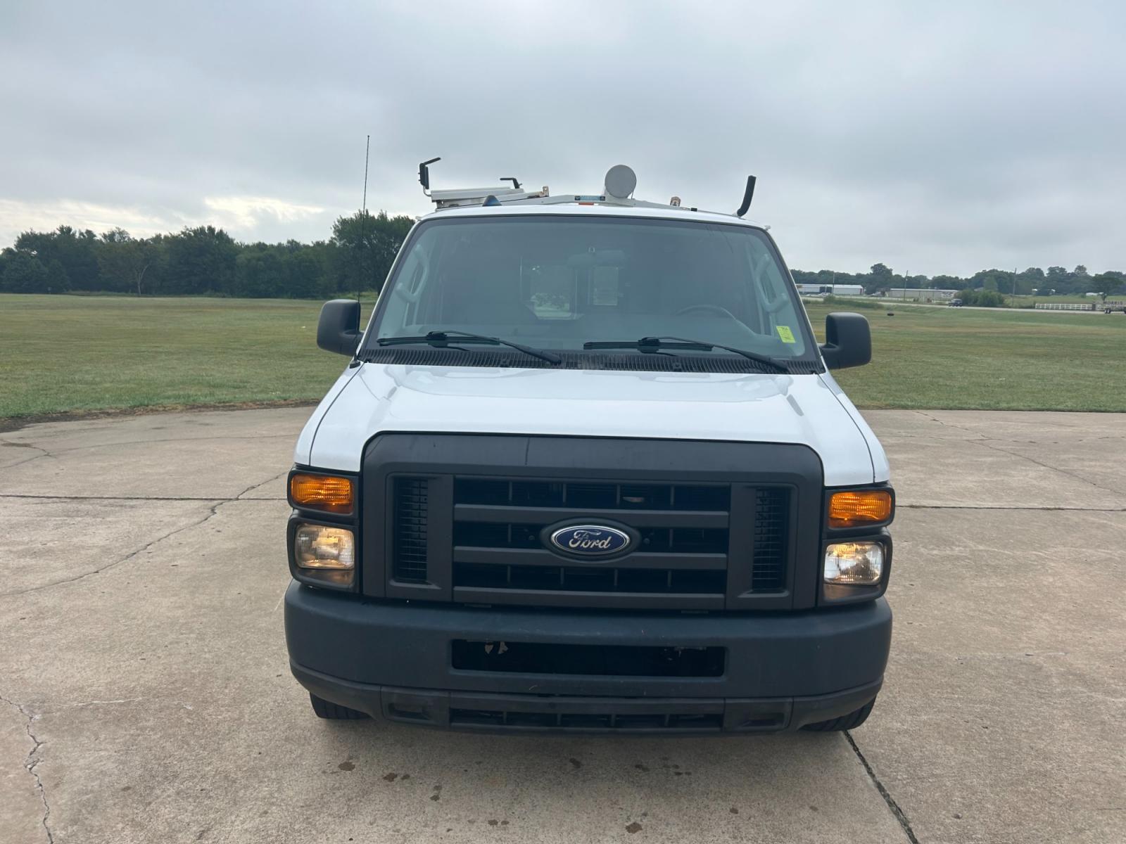 2010 White Ford E-Series Van E-250 (1FTNE2EL9AD) with an 5.4L V8 SOHC 16V engine, 4-Speed Automatic transmission, located at 17760 Hwy 62, Morris, OK, 74445, (918) 733-4887, 35.609104, -95.877060 - 2010 FORD E-SERIES VAN E-250 5.4 V8 DEDICATED CNG (COMPRESSED NATURAL GAS) DOES NOT RUN ON GASOLINE. FEATURES MANUAL SEATS, MANUAL LOCKS, MANUAL WINDOWS, MANUAL MIRRORS, AM/FM STEREO, 1500 WATT INVERTER. IT IS EQUIPPED WITH A CNG FUELING SYSTEM, IT RUNS ON COMPRESSED NATURAL GAS. A PREMIER ALTERNATI - Photo #2