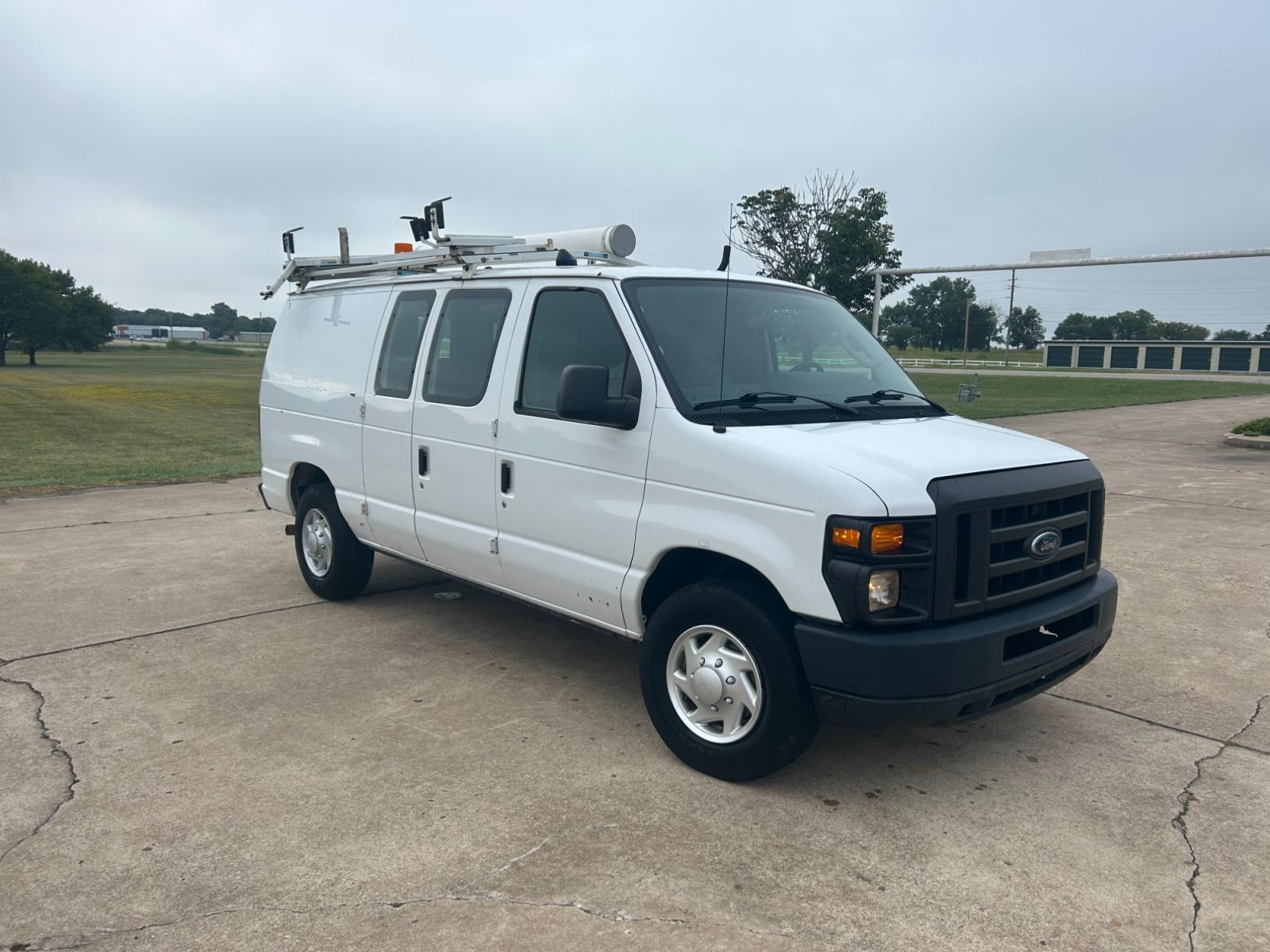 2010 White Ford E-Series Van E-250 (1FTNE2EL9AD) with an 5.4L V8 SOHC 16V engine, 4-Speed Automatic transmission, located at 17760 Hwy 62, Morris, OK, 74445, (918) 733-4887, 35.609104, -95.877060 - 2010 FORD E-SERIES VAN E-250 5.4 V8 DEDICATED CNG (COMPRESSED NATURAL GAS) DOES NOT RUN ON GASOLINE. FEATURES MANUAL SEATS, MANUAL LOCKS, MANUAL WINDOWS, MANUAL MIRRORS, AM/FM STEREO, 1500 WATT INVERTER. IT IS EQUIPPED WITH A CNG FUELING SYSTEM, IT RUNS ON COMPRESSED NATURAL GAS. A PREMIER ALTERNATI - Photo #3