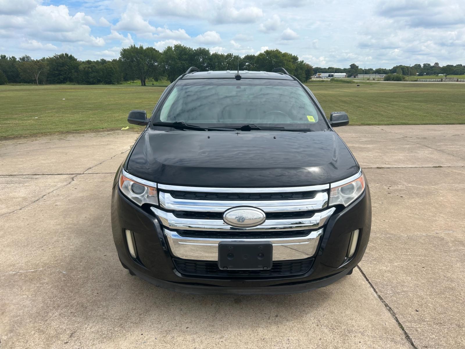 2013 BLACK Ford Edge Limited FWD (2FMDK3KC9DB) with an 3.5L V6 DOHC 24V engine, 6-Speed Automatic transmission, located at 17760 Hwy 62, Morris, OK, 74445, (918) 733-4887, 35.609104, -95.877060 - 2013 FORD EDGE LIMITED FWD 3.5L V6 FEATURES POWER SEATS, POWER WINDOWS, POWER MIRRORS, POWER LOCKS, TOUCHSCREEN RADIO, AM/FM STEREO, CD PLAYER, HEATED SEATS, LEATHER SEATS, DUAL CLIMATE CONTROL, MULTI-FUNCTION STEERING WHEEL CONTROLS, CRUISE CONTROL, HANDS-FREE CALLING, BACK-UP CAMERA. 54,502 MILES - Photo #1