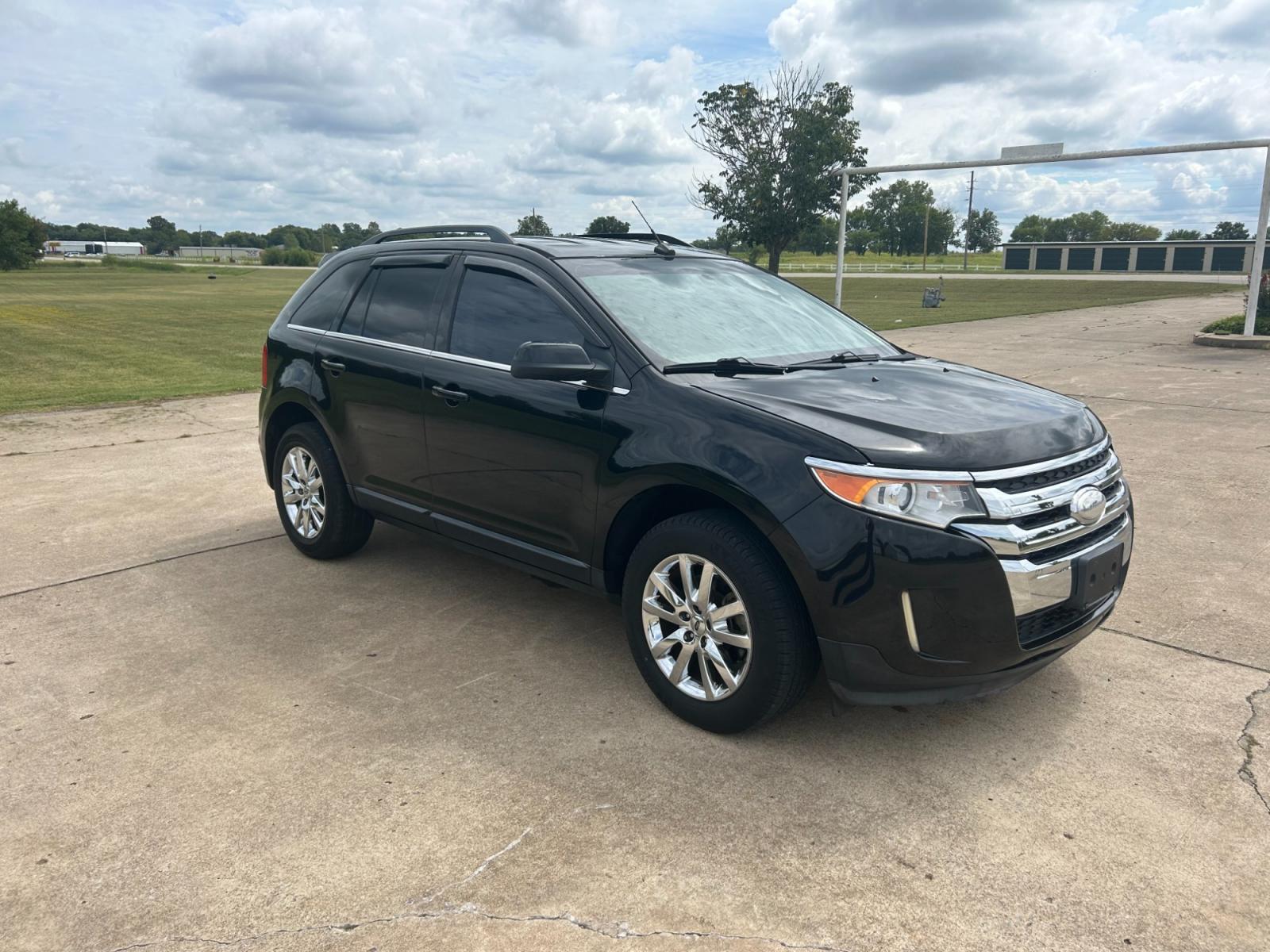 2013 BLACK Ford Edge Limited FWD (2FMDK3KC9DB) with an 3.5L V6 DOHC 24V engine, 6-Speed Automatic transmission, located at 17760 Hwy 62, Morris, OK, 74445, (918) 733-4887, 35.609104, -95.877060 - 2013 FORD EDGE LIMITED FWD 3.5L V6 FEATURES POWER SEATS, POWER WINDOWS, POWER MIRRORS, POWER LOCKS, TOUCHSCREEN RADIO, AM/FM STEREO, CD PLAYER, HEATED SEATS, LEATHER SEATS, DUAL CLIMATE CONTROL, MULTI-FUNCTION STEERING WHEEL CONTROLS, CRUISE CONTROL, HANDS-FREE CALLING, BACK-UP CAMERA. 54,502 MILES - Photo #2