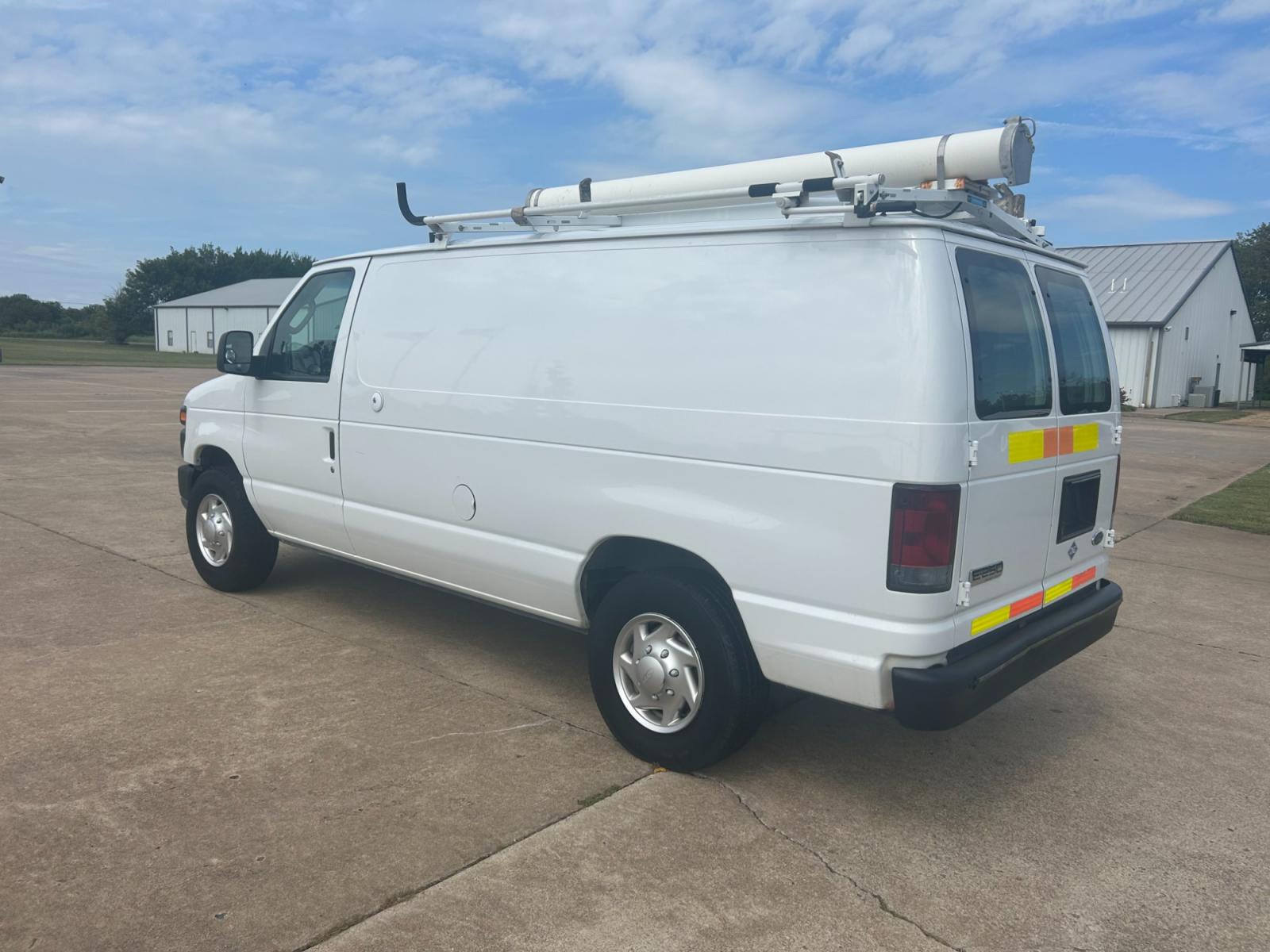 2010 White Ford E-Series Van E-250 (1FTNE2ELXAD) with an 5.4L V8 SOHC 16V engine, 4-Speed Automatic transmission, located at 17760 Hwy 62, Morris, OK, 74445, (918) 733-4887, 35.609104, -95.877060 - Photo #6