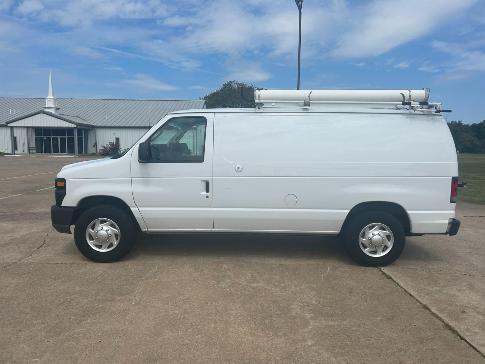2010 White Ford E-Series Van E-250 (1FTNE2ELXAD) with an 5.4L V8 SOHC 16V engine, 4-Speed Automatic transmission, located at 17760 Hwy 62, Morris, OK, 74445, (918) 733-4887, 35.609104, -95.877060 - Photo #7