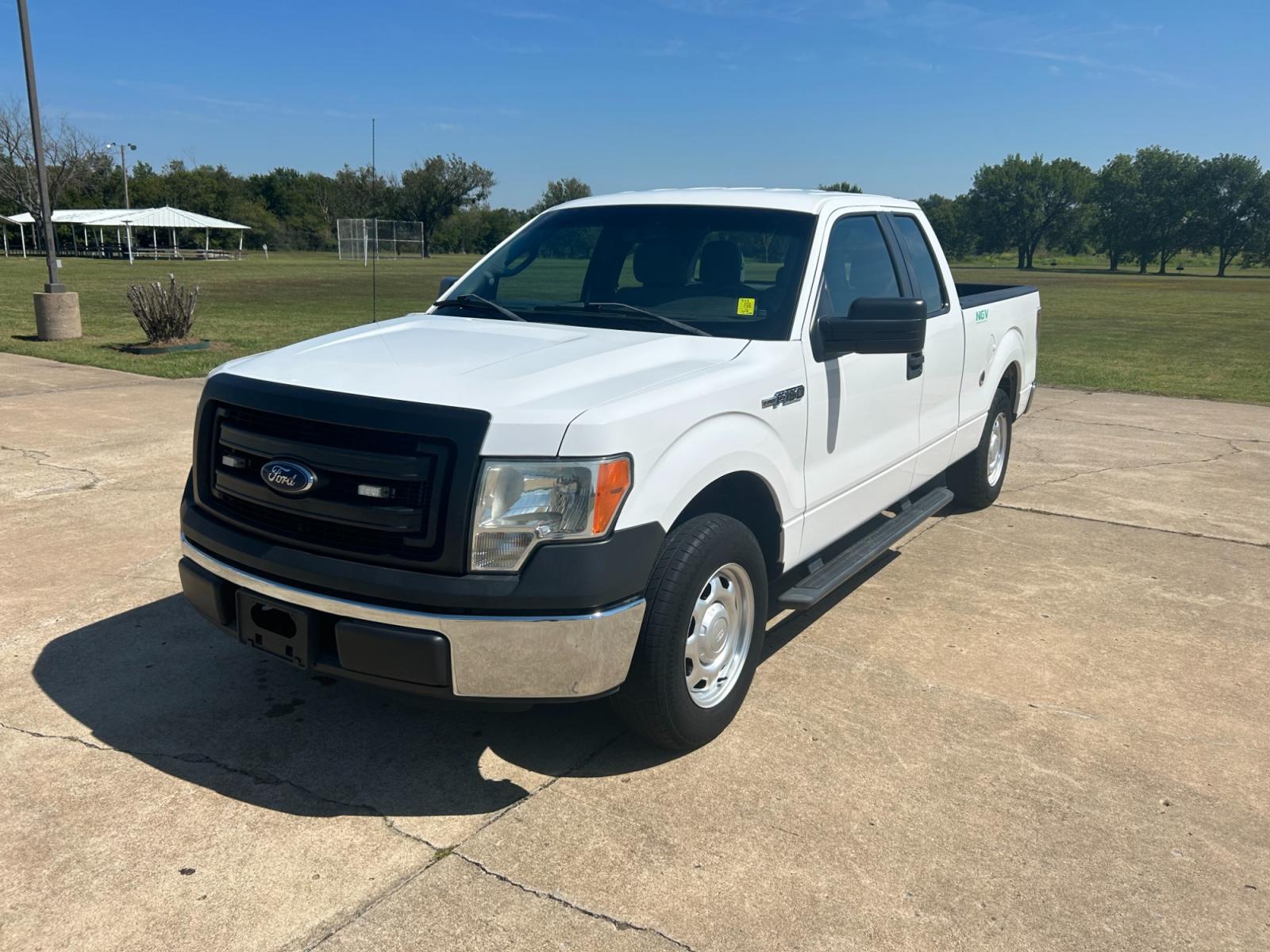 2014 White Ford F-150 XLT SuperCab 8-ft. Bed 2WD (1FTEX1CM5EK) with an 3.7L V6 DOHC 24V engine, 6-Speed Automatic transmission, located at 17760 Hwy 62, Morris, OK, 74445, (918) 733-4887, 35.609104, -95.877060 - 2014 FORD F-150 XLT SUPERCAB 8-ft. BED 2WD 3.8L V6 BI-FUEL (RUNS ON BOTH CNG OR GASOLINE) FEATURES POWER LOCKS, POWER WINDOWS, AM/FM STEREO, SIRIUS XM STEREO, CD PLAYER, AUXILLARY PORT, CRUISE CONTROL, TRACTION CONTROL, MULTI-FUNCTIONING STEERING WHEEL CONTROLS, BACK-UP CAMERA, BED LINER. HAS 75,030 - Photo #0
