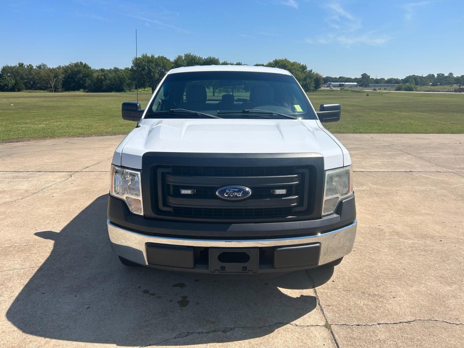 2014 White Ford F-150 XLT SuperCab 8-ft. Bed 2WD (1FTEX1CM5EK) with an 3.7L V6 DOHC 24V engine, 6-Speed Automatic transmission, located at 17760 Hwy 62, Morris, OK, 74445, (918) 733-4887, 35.609104, -95.877060 - 2014 FORD F-150 XLT SUPERCAB 8-ft. BED 2WD 3.8L V6 BI-FUEL (RUNS ON BOTH CNG OR GASOLINE) FEATURES POWER LOCKS, POWER WINDOWS, AM/FM STEREO, SIRIUS XM STEREO, CD PLAYER, AUXILLARY PORT, CRUISE CONTROL, TRACTION CONTROL, MULTI-FUNCTIONING STEERING WHEEL CONTROLS, BACK-UP CAMERA, BED LINER. HAS 75,030 - Photo #1