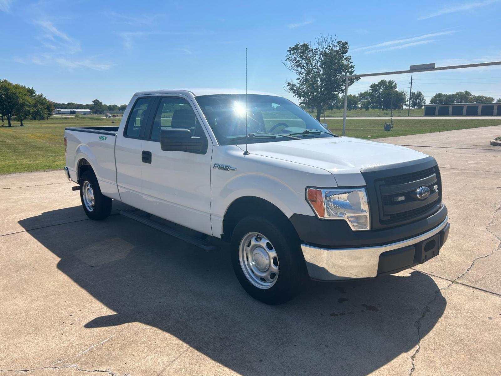 2014 White Ford F-150 XLT SuperCab 8-ft. Bed 2WD (1FTEX1CM5EK) with an 3.7L V6 DOHC 24V engine, 6-Speed Automatic transmission, located at 17760 Hwy 62, Morris, OK, 74445, (918) 733-4887, 35.609104, -95.877060 - 2014 FORD F-150 XLT SUPERCAB 8-ft. BED 2WD 3.8L V6 BI-FUEL (RUNS ON BOTH CNG OR GASOLINE) FEATURES POWER LOCKS, POWER WINDOWS, AM/FM STEREO, SIRIUS XM STEREO, CD PLAYER, AUXILLARY PORT, CRUISE CONTROL, TRACTION CONTROL, MULTI-FUNCTIONING STEERING WHEEL CONTROLS, BACK-UP CAMERA, BED LINER. HAS 75,030 - Photo #2
