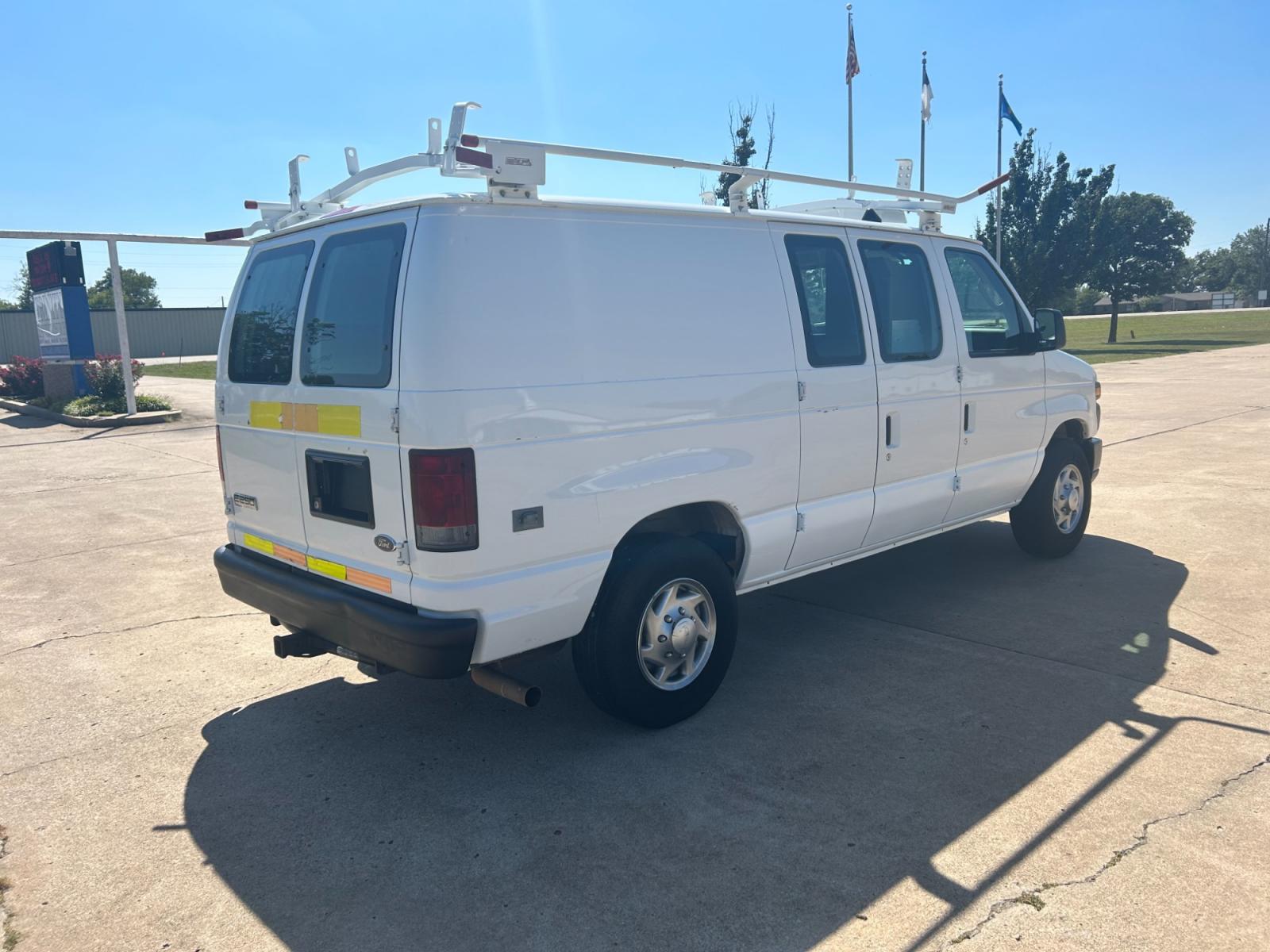 2010 White Ford E-Series Van E-250 (1FTNE2EL9AD) with an 5.4L V8 SOHC 16V engine, 4-Speed Automatic transmission, located at 17760 Hwy 62, Morris, OK, 74445, (918) 733-4887, 35.609104, -95.877060 - Photo #5